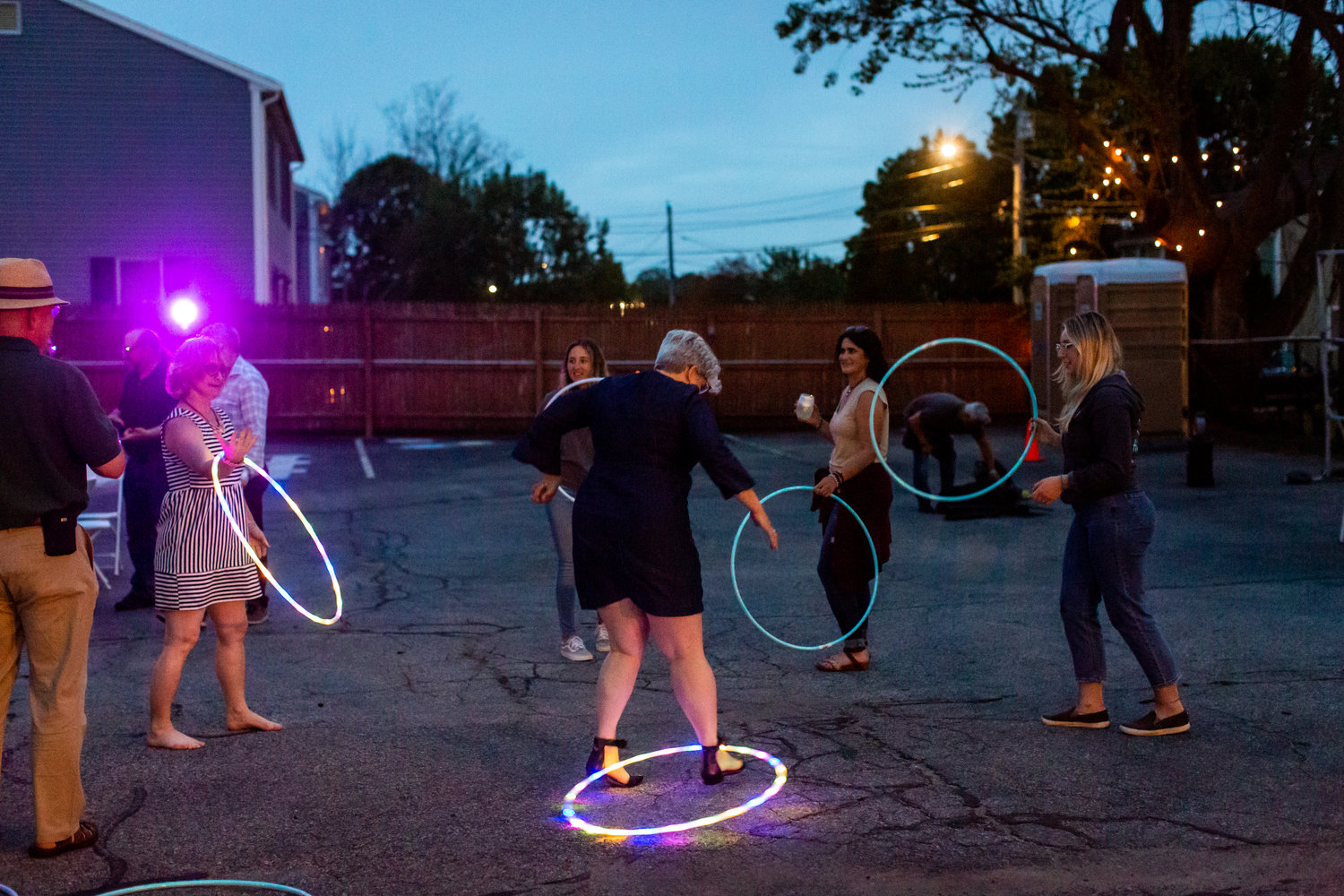 Joe Wagenback, Erin Read, Sarah Barboza, Melissa Goldstein, and Kristen Read take a spin with glow-in-the-dark hula hoops.