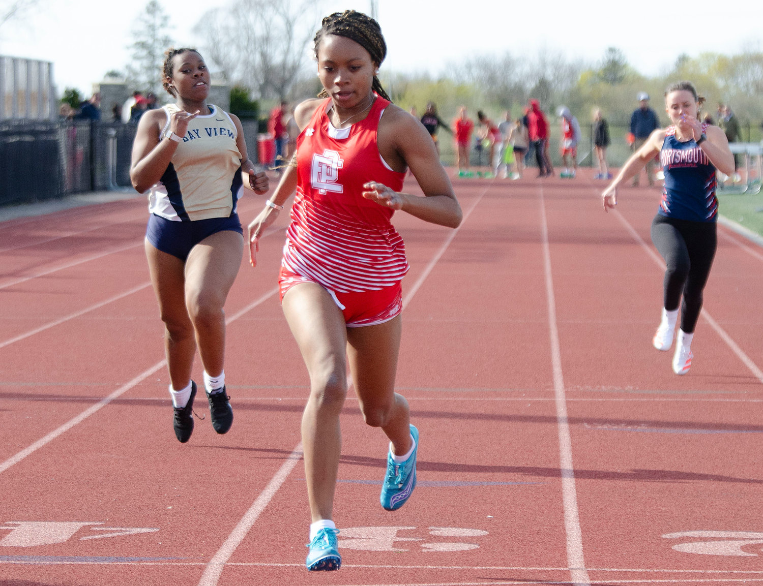 East Providence High School's Nazarae Phillip wins the 100 meter race during a regular season meet in Portsmouth earlier this spring. Late weekend, Phillip accounted for all of the Townies' points in the girls' Class A Championship meet in Coventry.