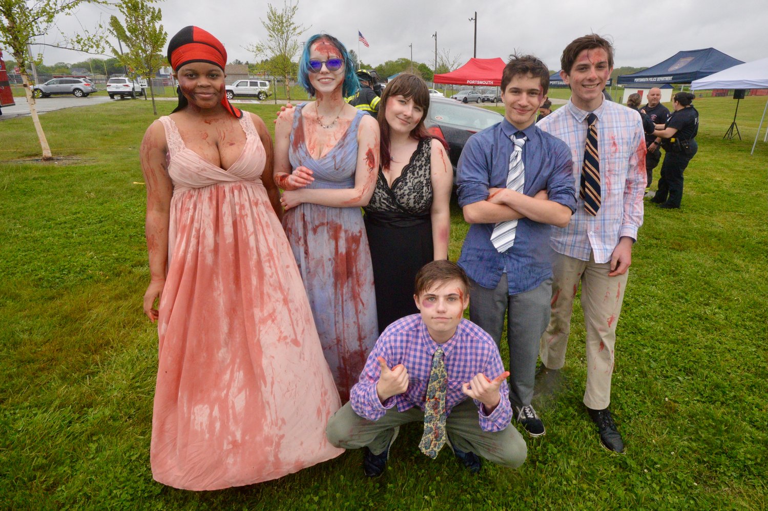 They may look like the cast from a slasher or zombie flick, but these (fake) blood-spattered Portsmouth High School students were actually actors in a mock drunk-driving crash reenactment staged by the Portsmouth Police Department outside PHS last week. They are (from left): Renesha Duncan, Megan Conant, Anastacia Inman, Josh Champagne (squatting), Walker Anderson, and Jackson Benner.