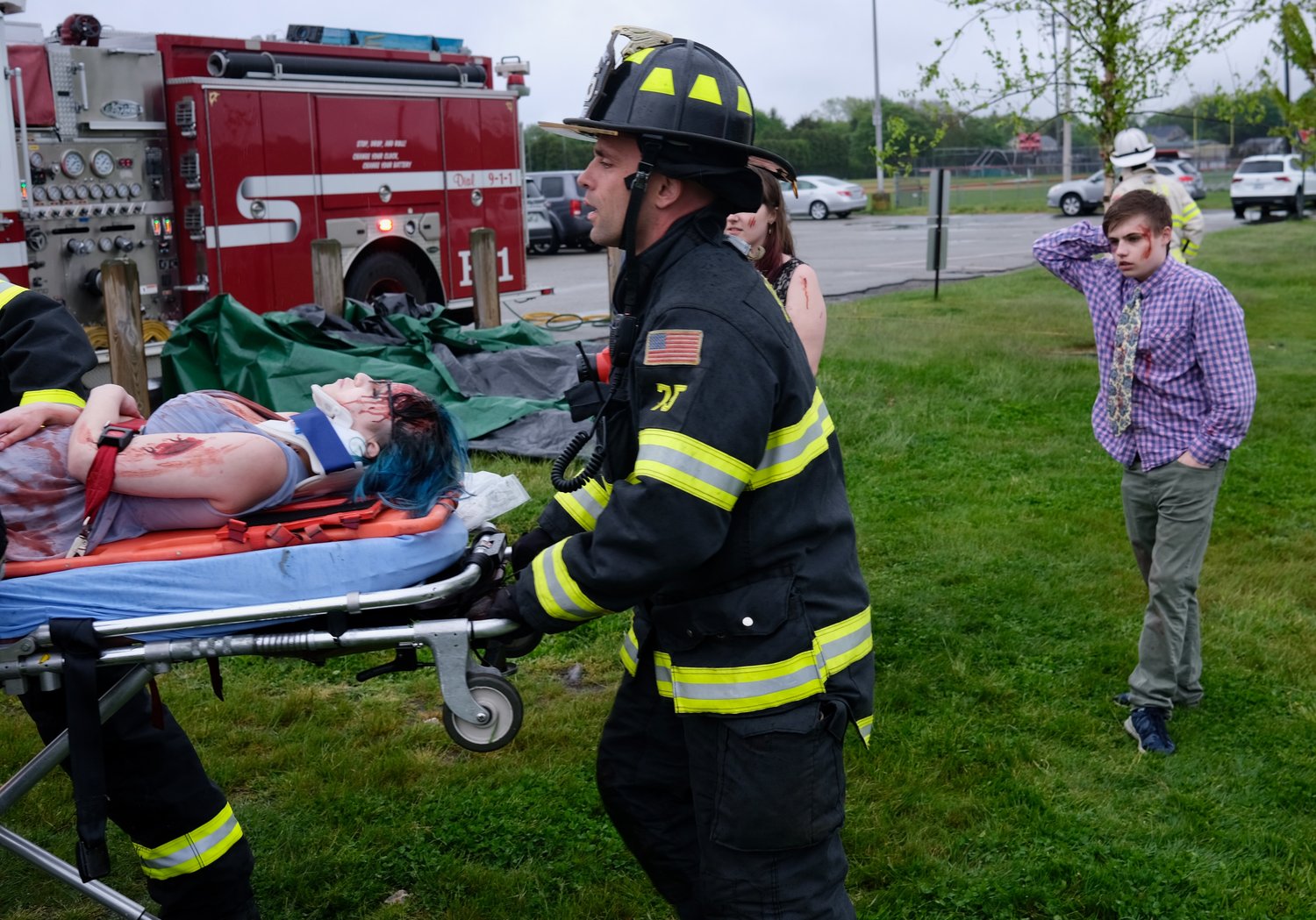 Megan Conant played a student who had to be removed from the back of a car using the Jaws of Life. Her friend Josh Champagne helplessly looks on as she’s taken away on a stretcher.