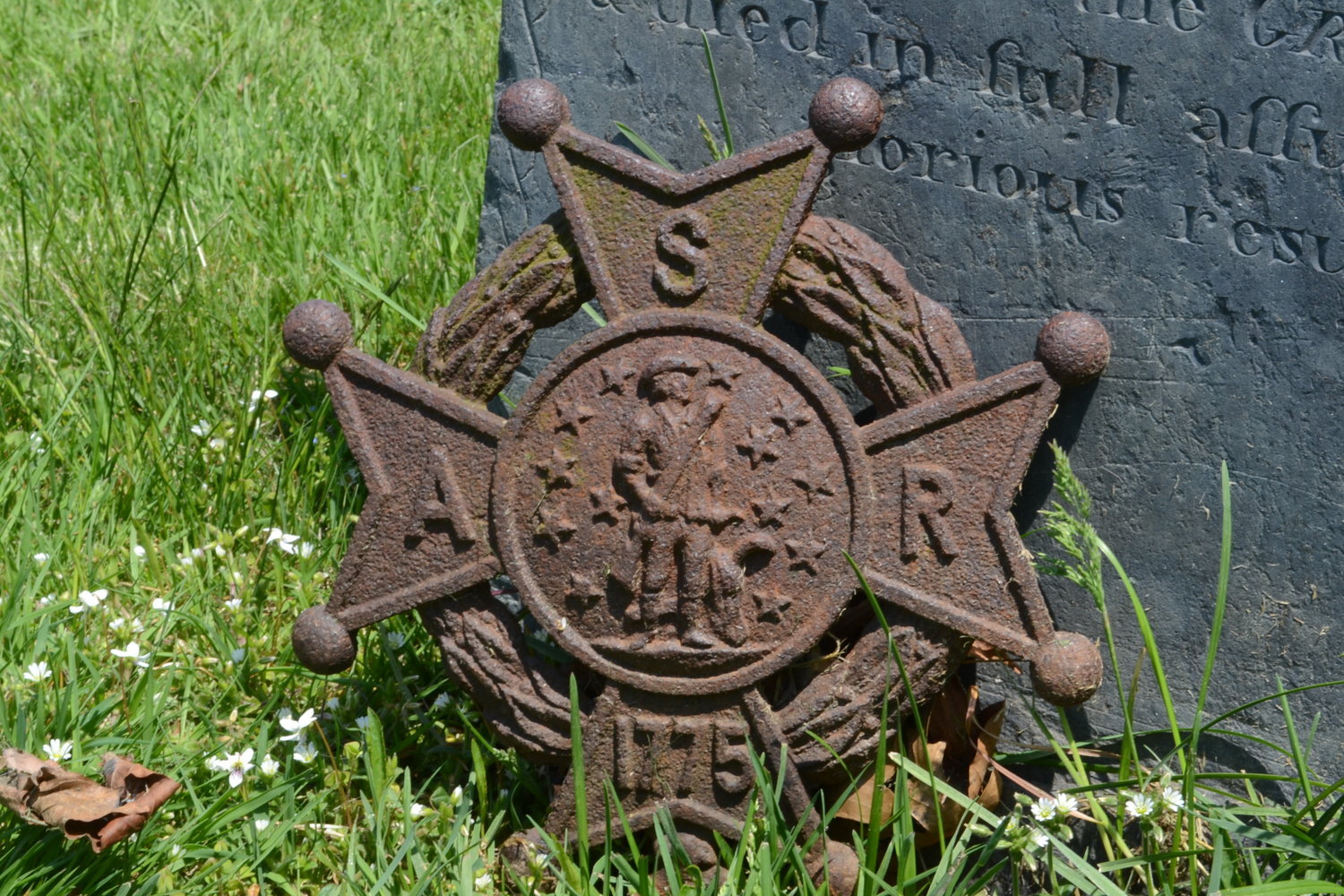 Gravestones marked as burial sites of Sons of the American Revolution are common throughout the nearly 40-acre cemetery. In total, there are over 3,200 buried military veterans at the North Burial Ground.