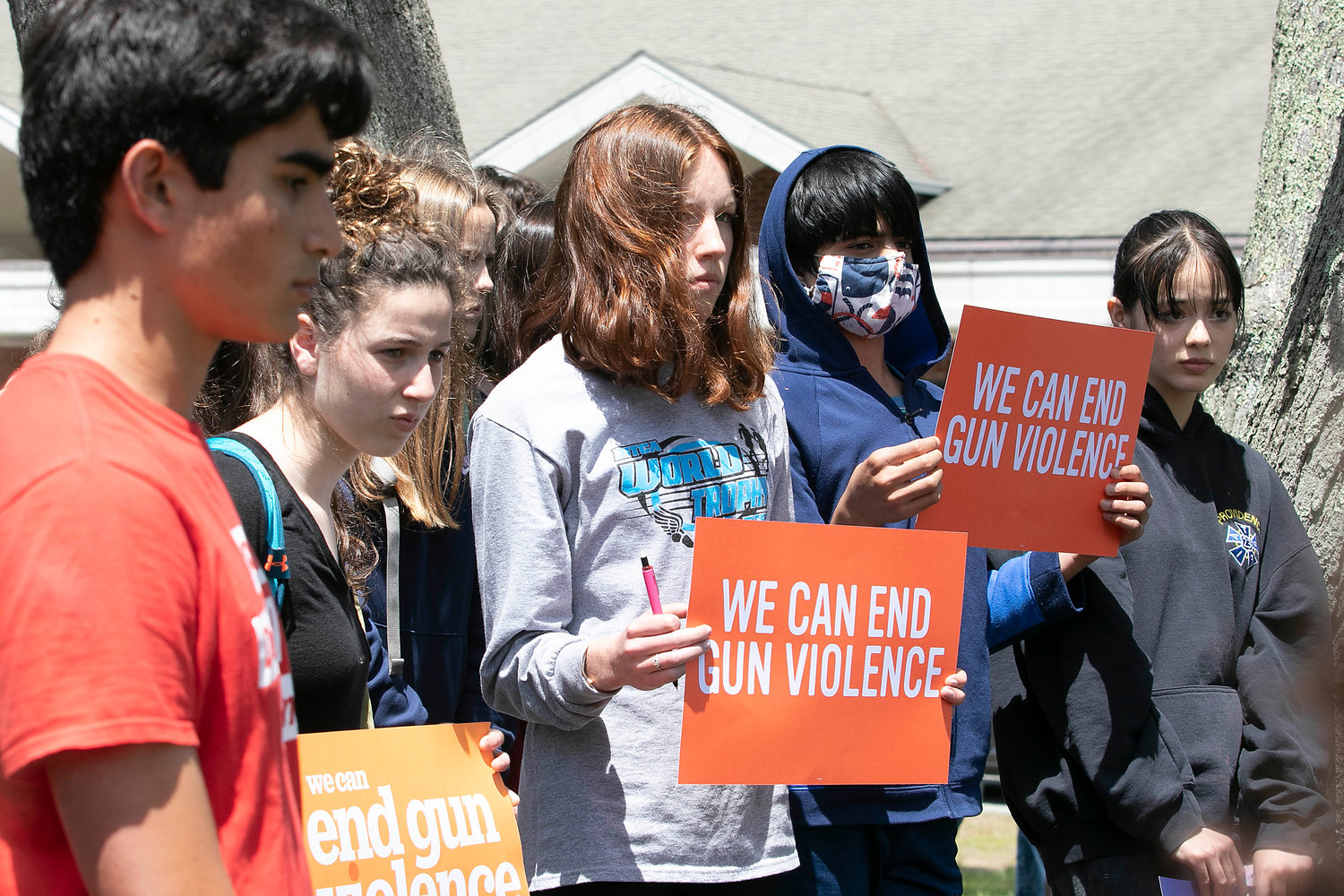 Students rally against gun violence in front of Barrington High School on Thursday.