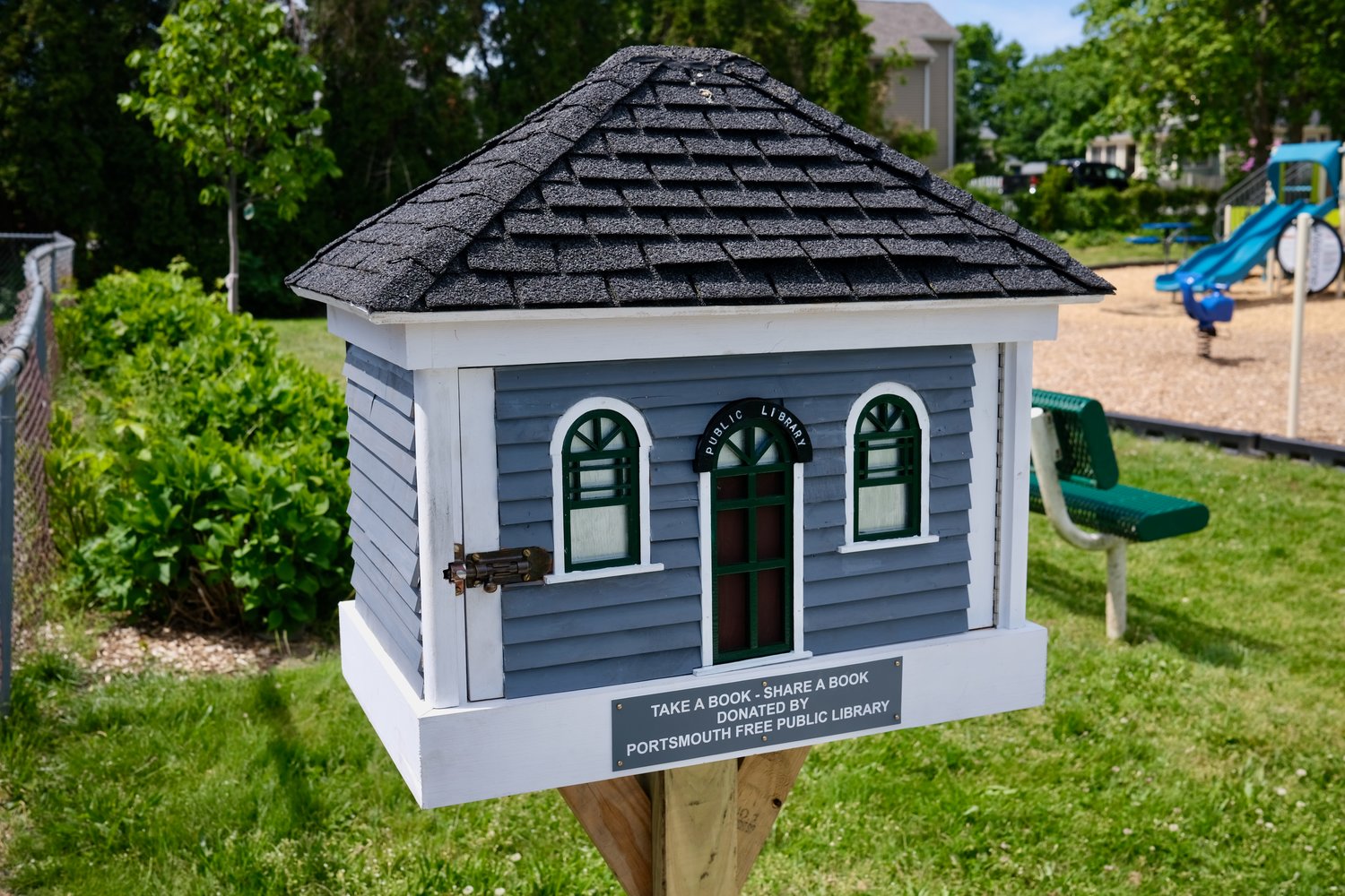 The Portsmouth Free Public Library recently donated this little library, which can be found at the entrance to the Island Park Playground on Ormerod Avenue. It was built by Paul Shoenbucher and installed by the Department of Public Works.