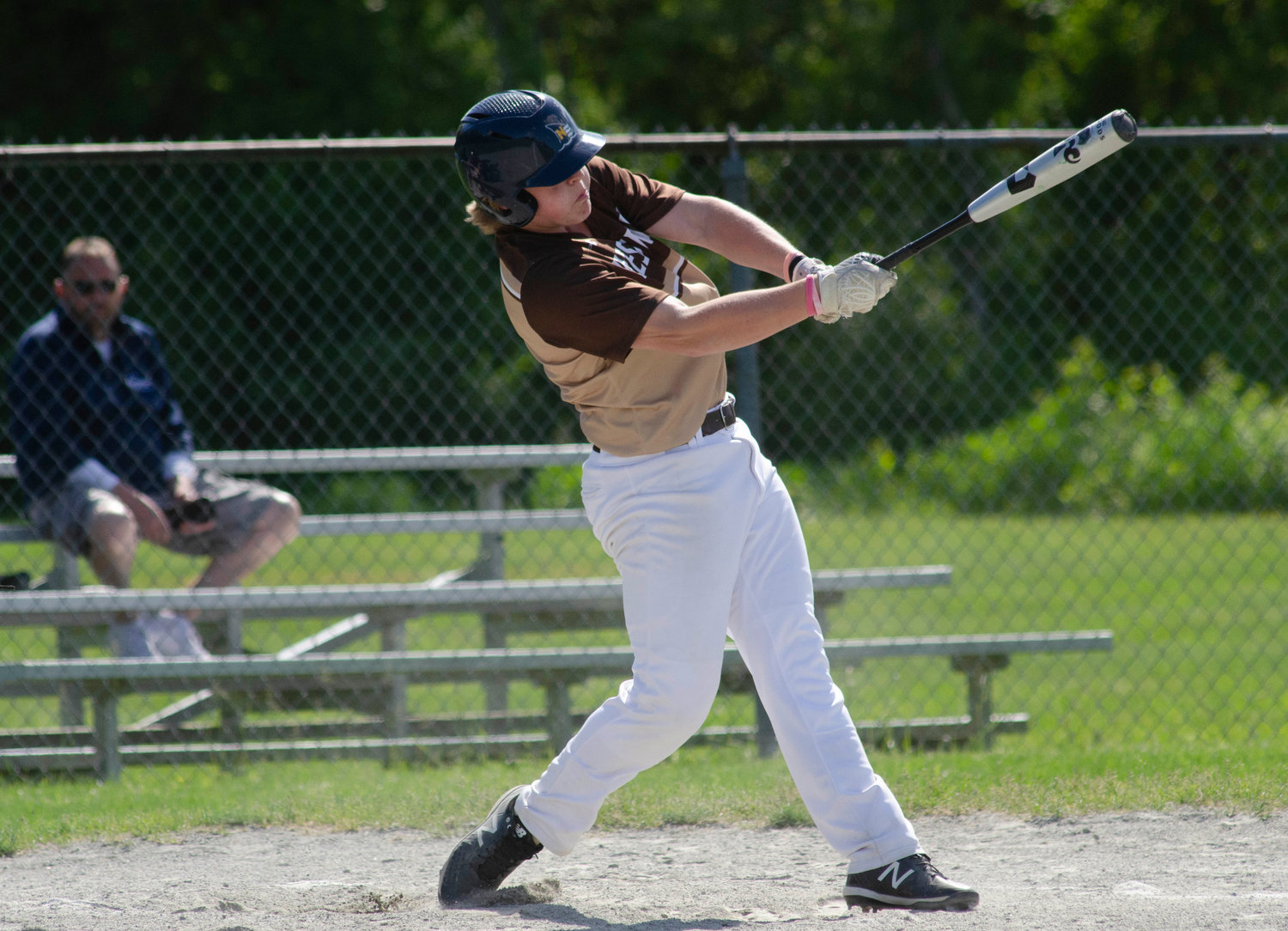 Connor James smashes one of his three hits during the team's game against West Bridgewater.