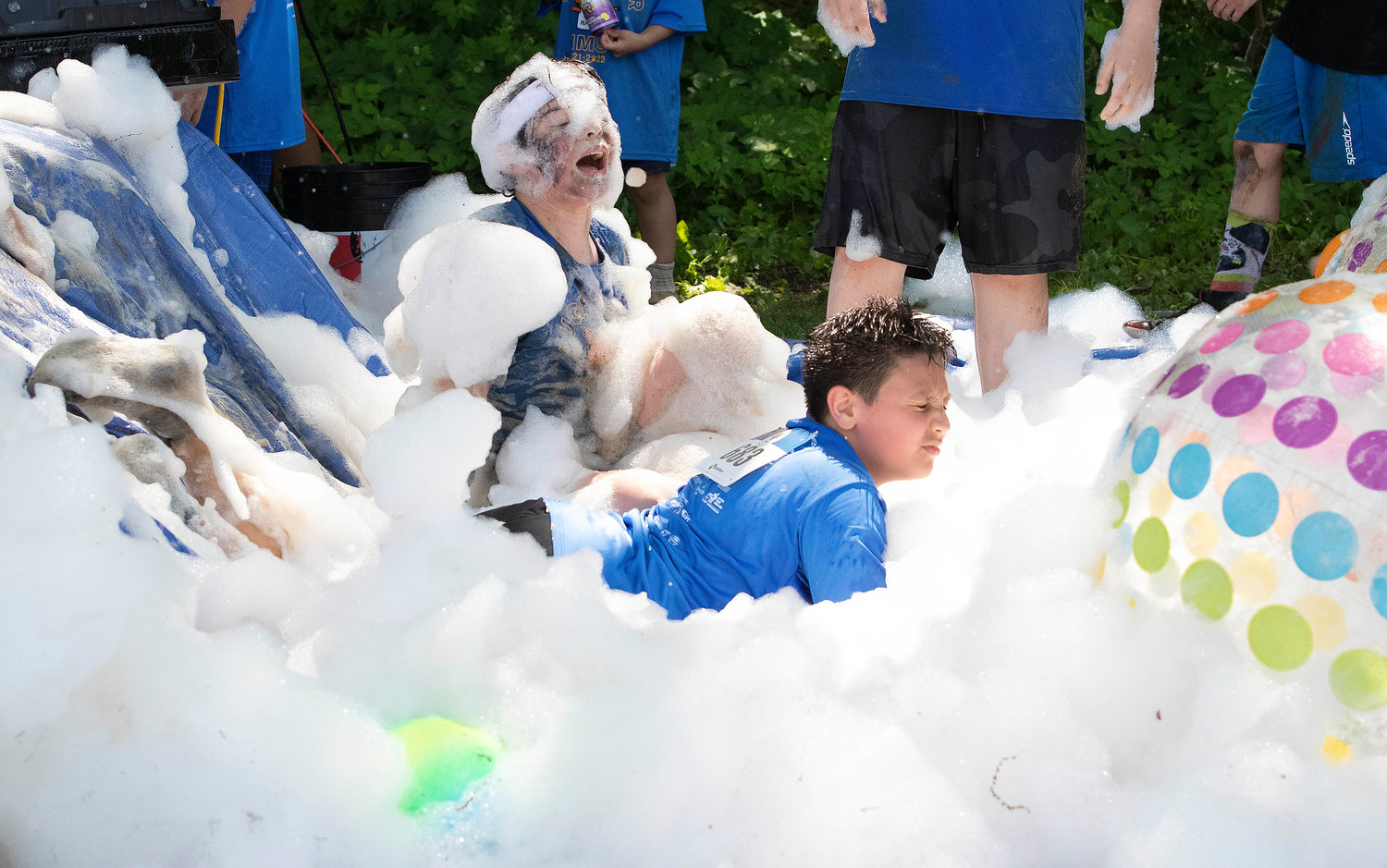 After running through some mud, competitors had the opportunity to clean themselves off in an over-sized bubble obstacle.