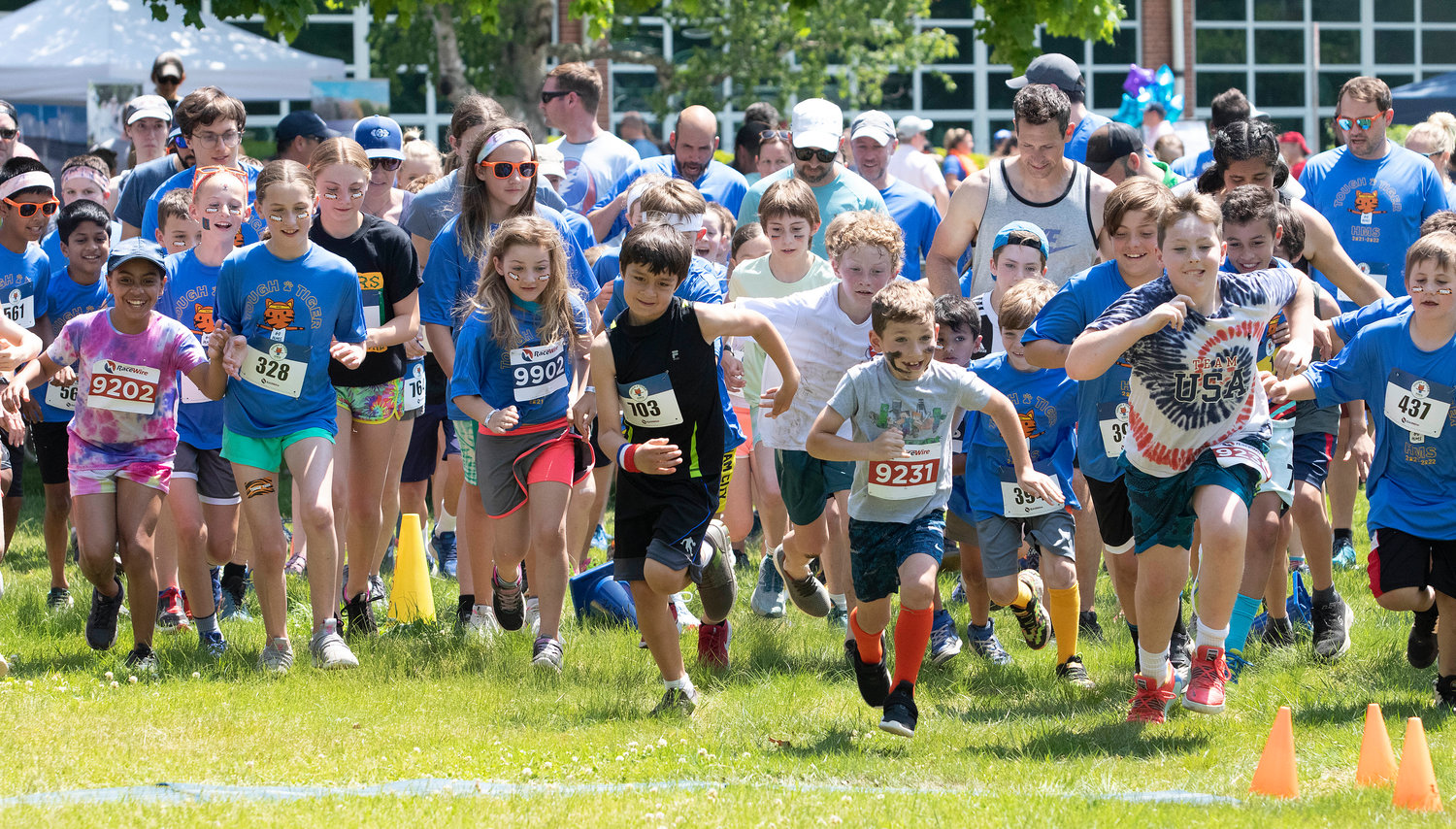 Dozens of competitors break from the starting line at this year’s Tough Tiger adventure race at Hampden Meadows School.