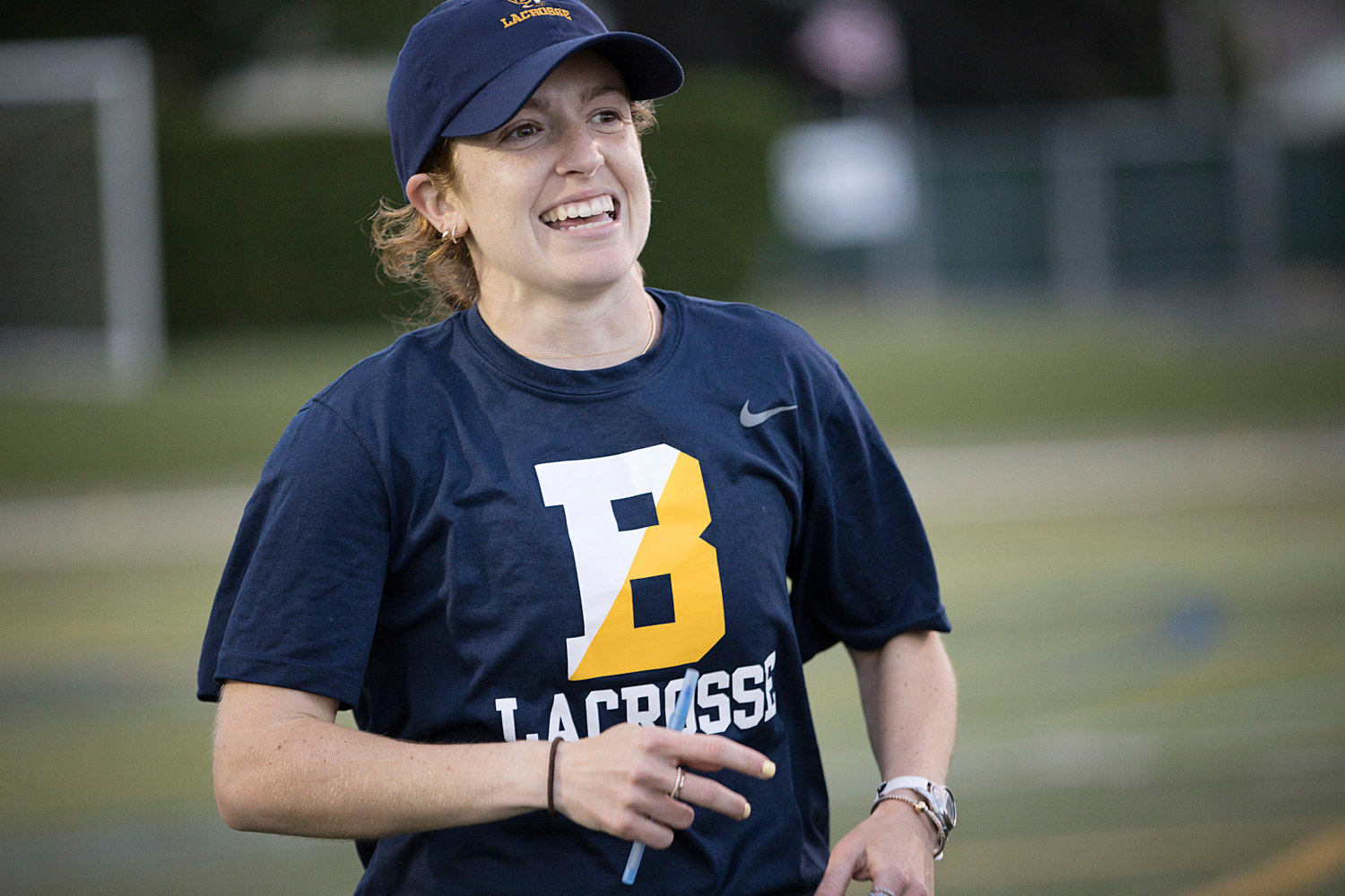 Head coach Ariana Cambio smiles after her team defeats Moses Brown in the Division 1 girls lacrosse finals on Saturday.