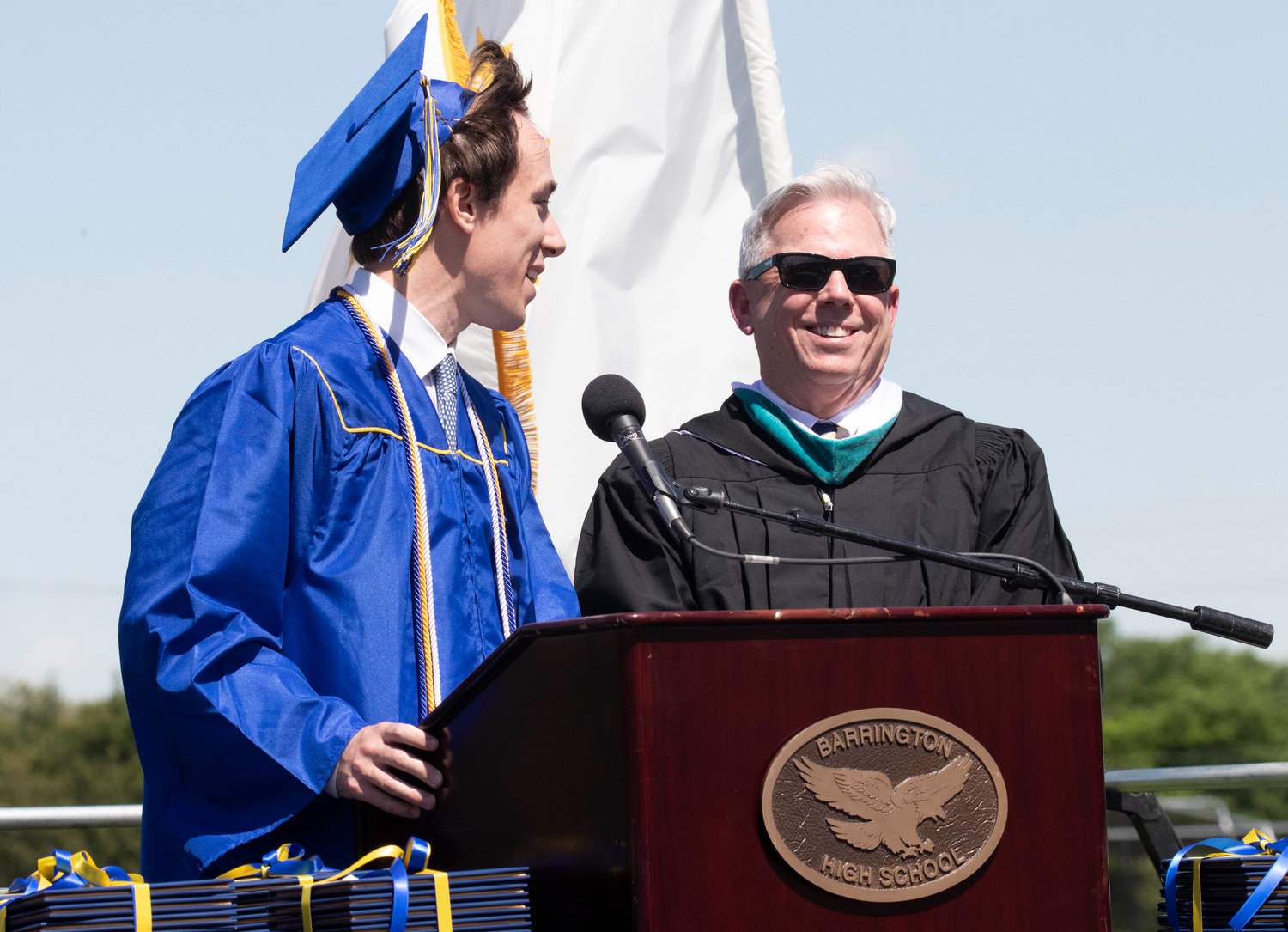 Graduating senior Jack Culton shares a special tribute to longtime BHS Principal Joe Hurley during Sunday’s ceremony. Hurley is retiring at the end of the school year.