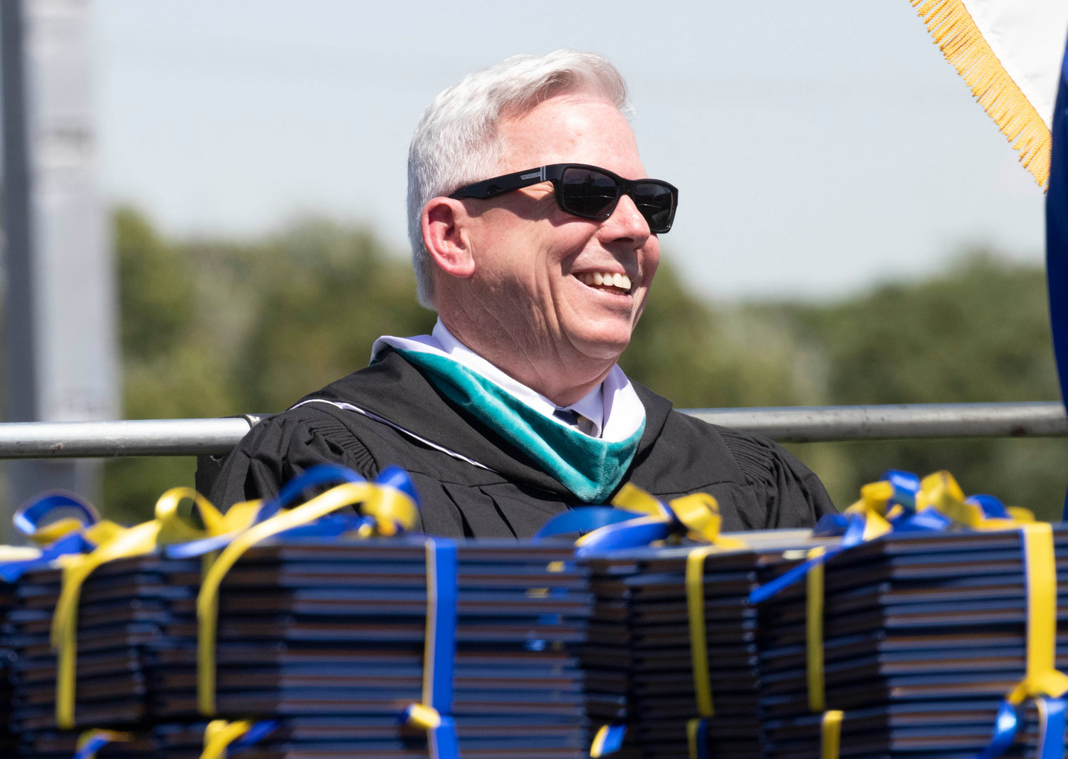 Barrington High School Principal Joe Hurley is all smiles during Sunday’s graduation ceremony. Hurley retires at the end of the year.
