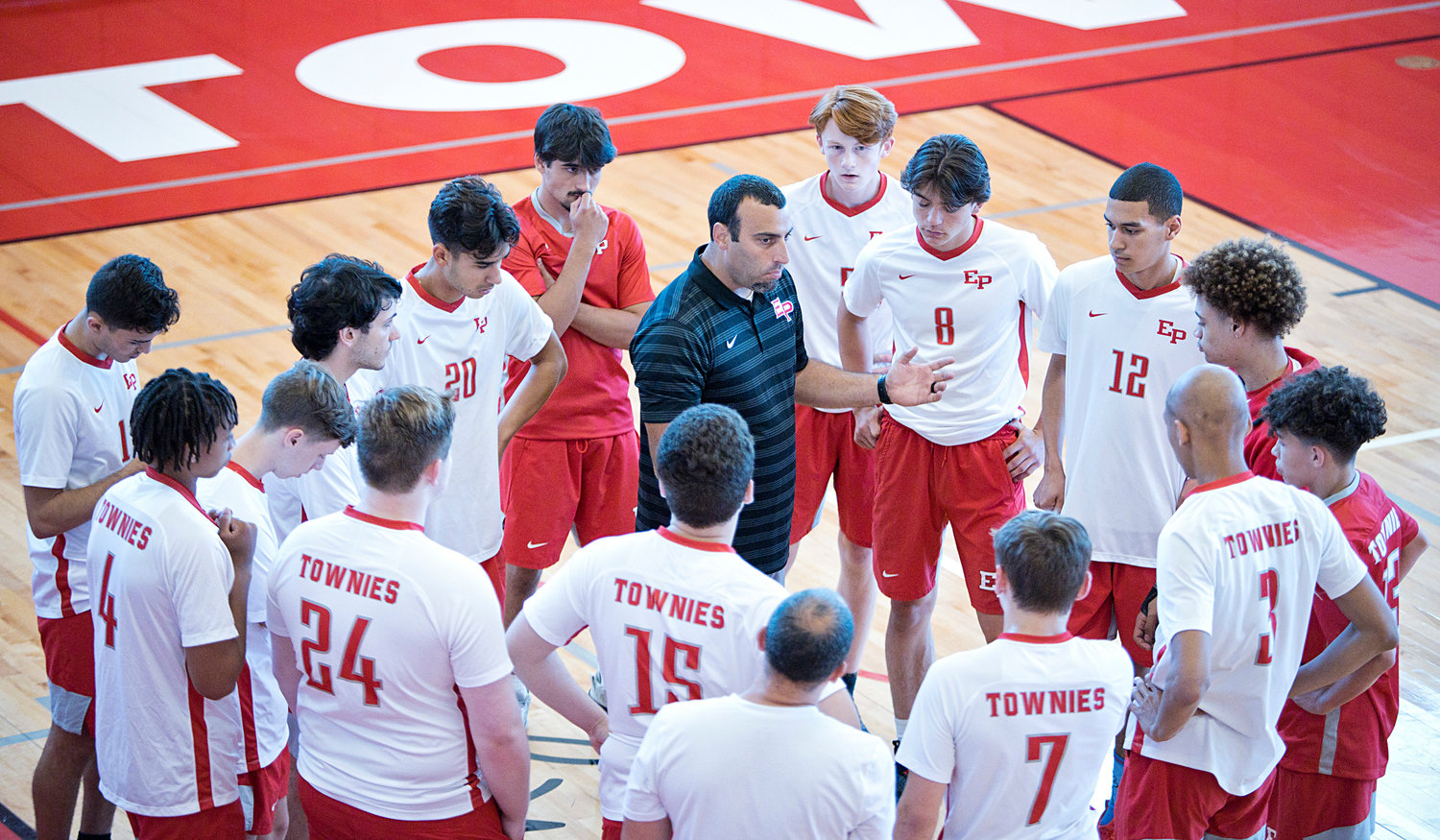 East Providence High School’s head coach Dan Cabral, talks with his team between sets of Wednesday, June 8, Division II boys' volleyball semifinal match against Westerly.