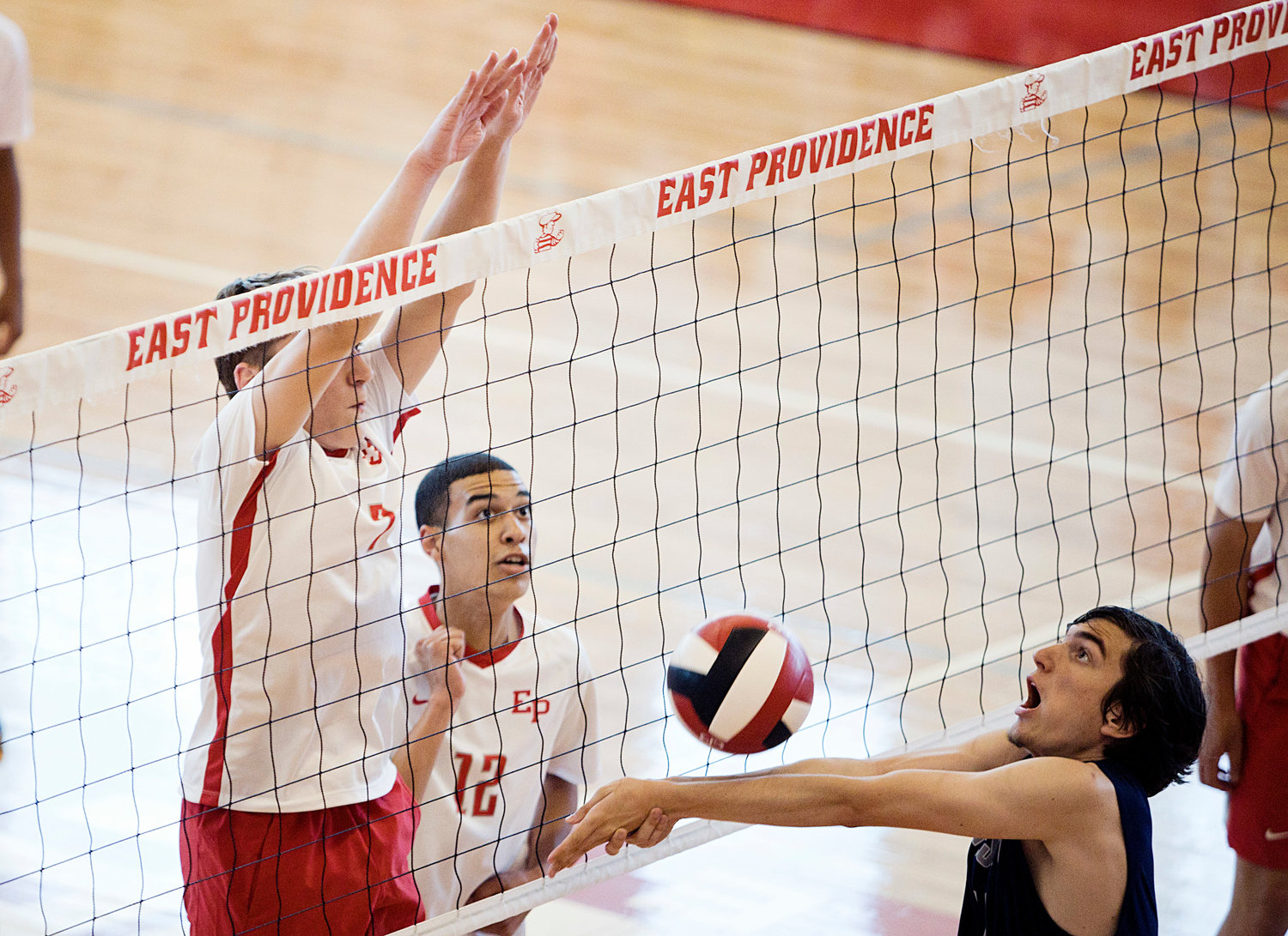 East Providence High School’s D.J. Lepine and Grant Wosencroft anticipate the ball while competing against Westerly in the Division II boys' volleyball semifinals, Wednesday, June 8.