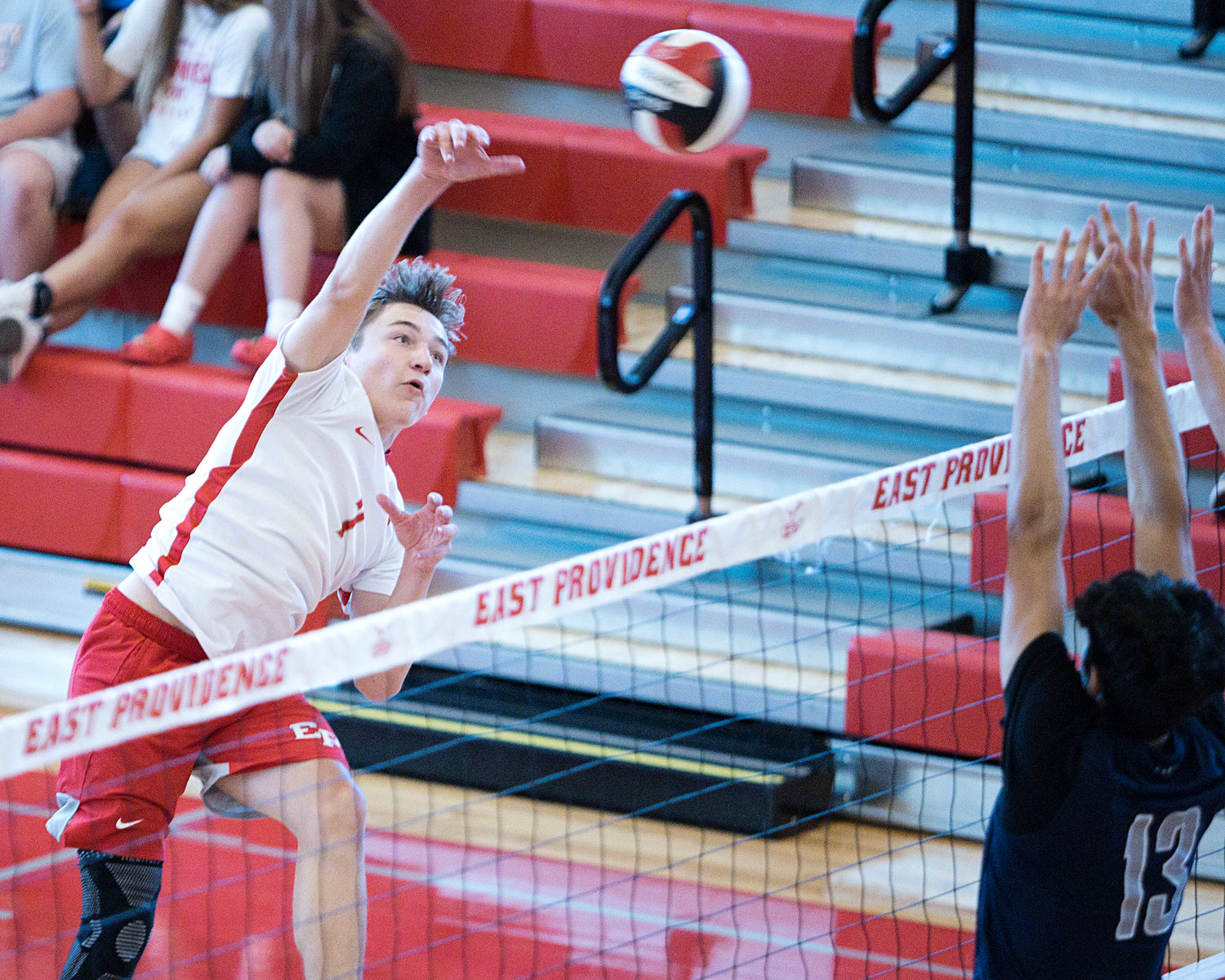 East Providence High School’s D.J. Lepine sends a hard spike over the net against Westerly in the Division II boys' volleyball semifinals, Wednesday, June 8.