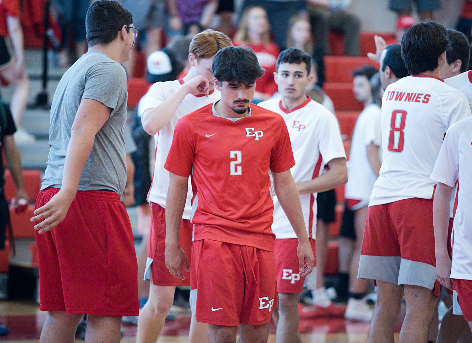 A dejected group of EPHS boys' volleyball team members walks off the court following the Townies' 3-0 loss to visiting Westerly Wednesday, June 8, in the Division II playoff semifinals.