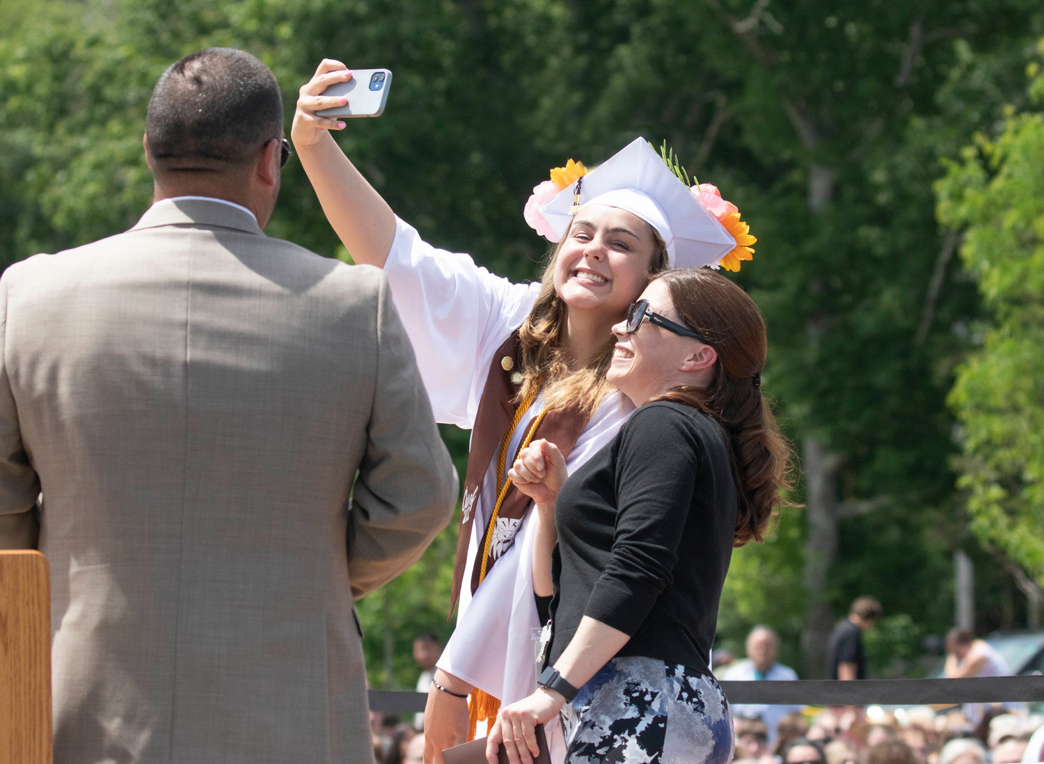 Abigail Gaudreau takes a selfie with principal Dr. Kerry McKinnon as she receives her diploma. 