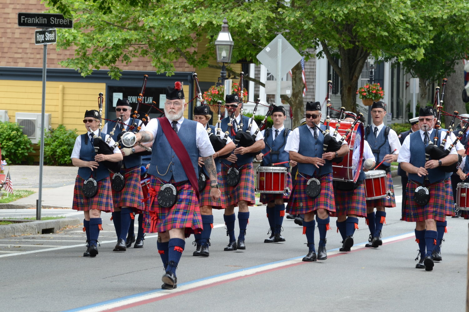 The Rhode Island Highlanders Pipe Band impressed with their marching and bagpipe playing.