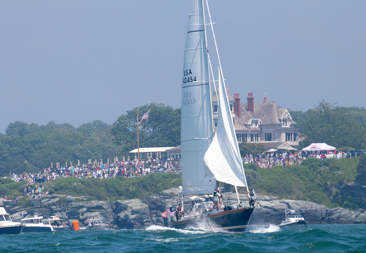 Chasseur, a Little Harbor 54, owned by Miles Cook of NYYC, sails by Castle Hill.