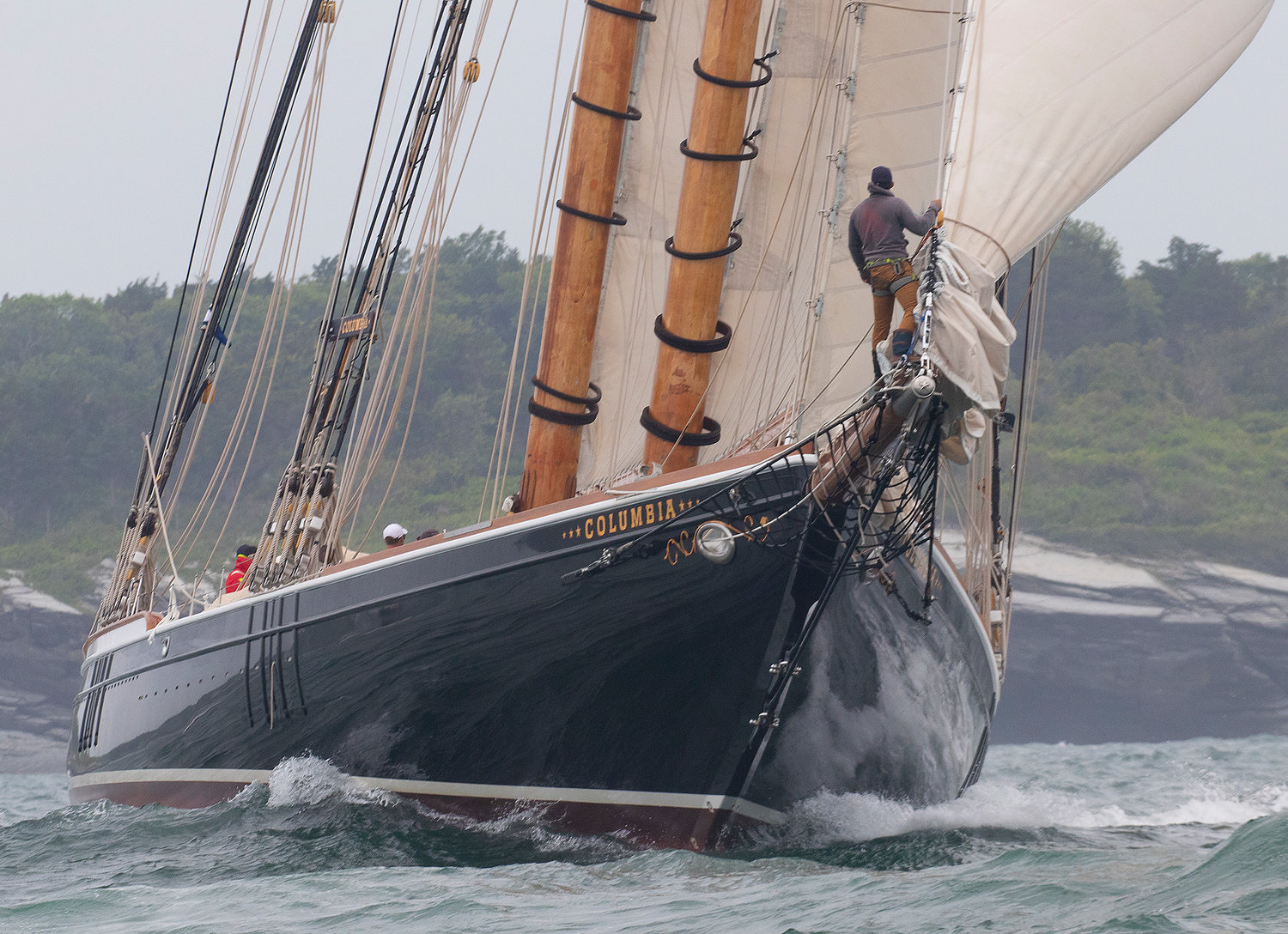 Columbia, a Herreshoff racing schooner owned by Martin Sutter of the CCA and NYYC, preps for the start of the Newport Bermuda Race on Friday, June 17, in Newport Harbor.