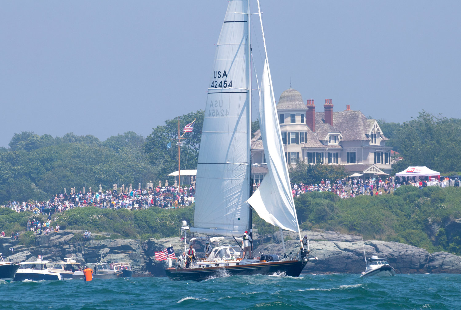 Chasseur, a Little Harbor 54, owned by Miles Cook of NYYC, prepares for the start of the race as it sails by crowded Castle Hill on Friday June 17.