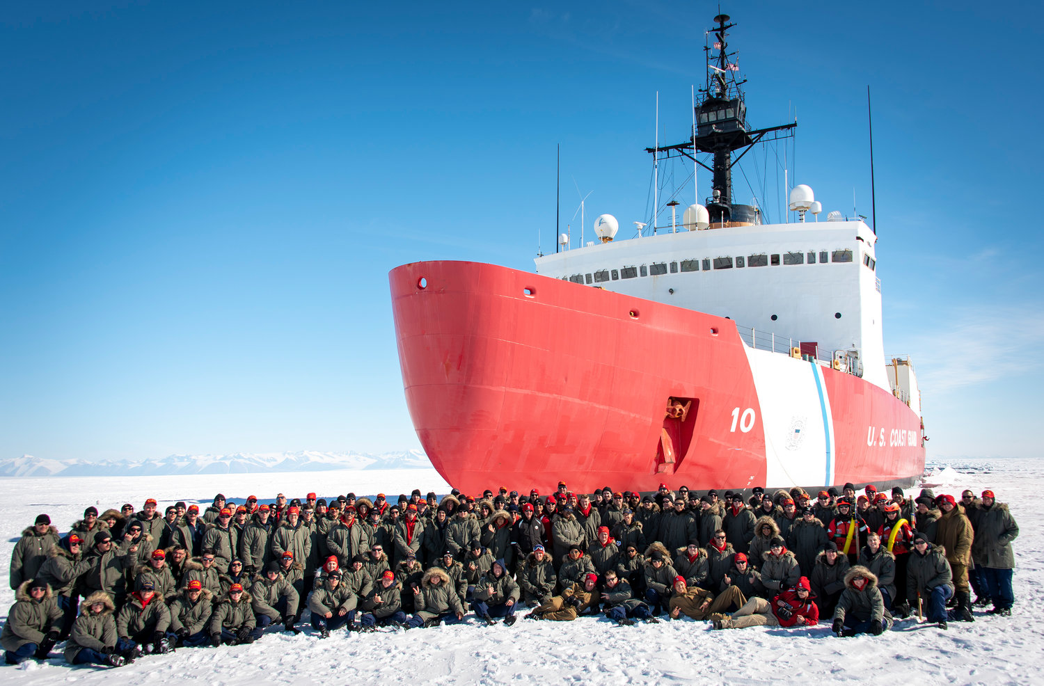 Frank Parenti with the rest of the crew of the Polar Star on the ice in Antarctica during a delivery to McMurdo Station.