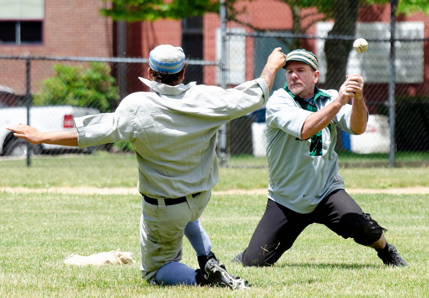 Providence Grays base runner John Carlevale safely steals second base as Lisbon Tunnelmen second baseman Matt Sponge Reynolds bobbles the throw, during the Bristol Fourth of July Vintage Baseball game on the town common on Saturday afternoon.