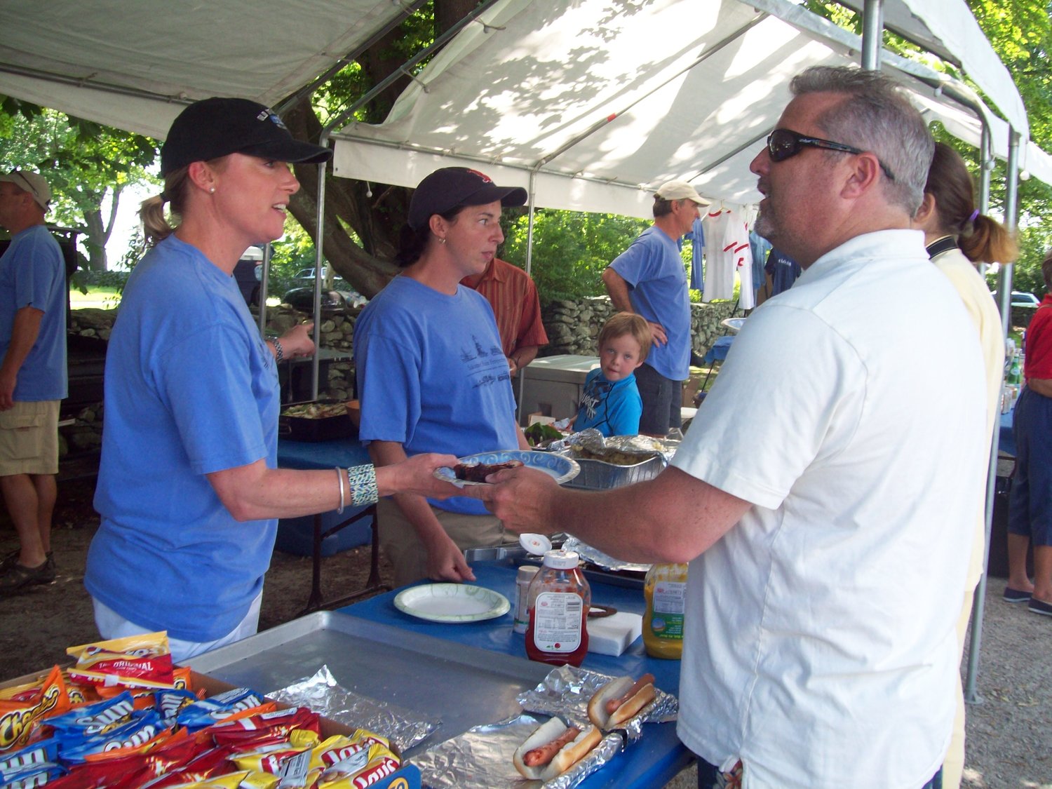 Visitors enjoy lunch at last year's Family Day at the Little Compton Historical Society.