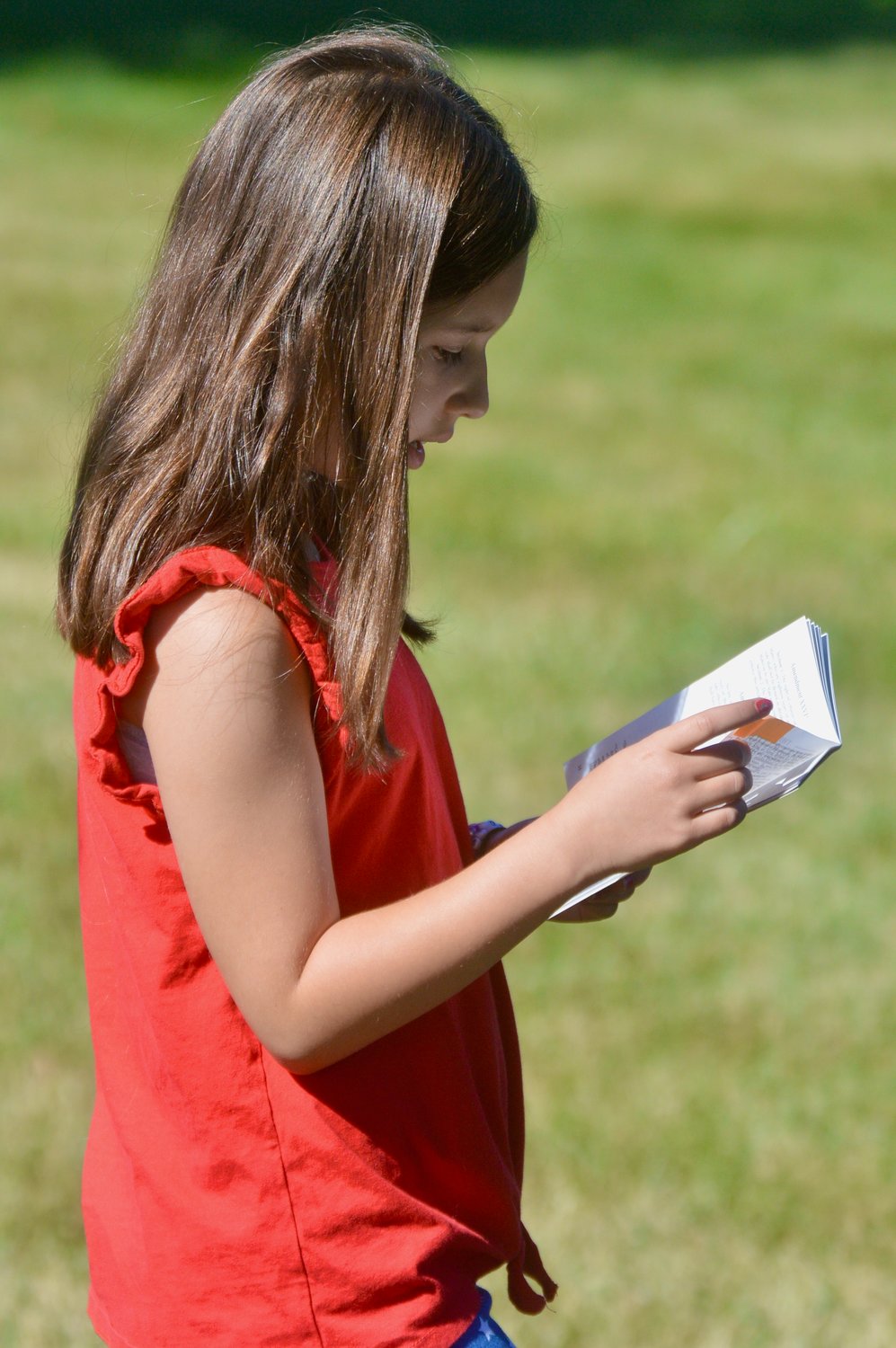 Morgan Shiner, 9, takes her turn reading a passage. She was visiting the area from Philadelphia along with her family.