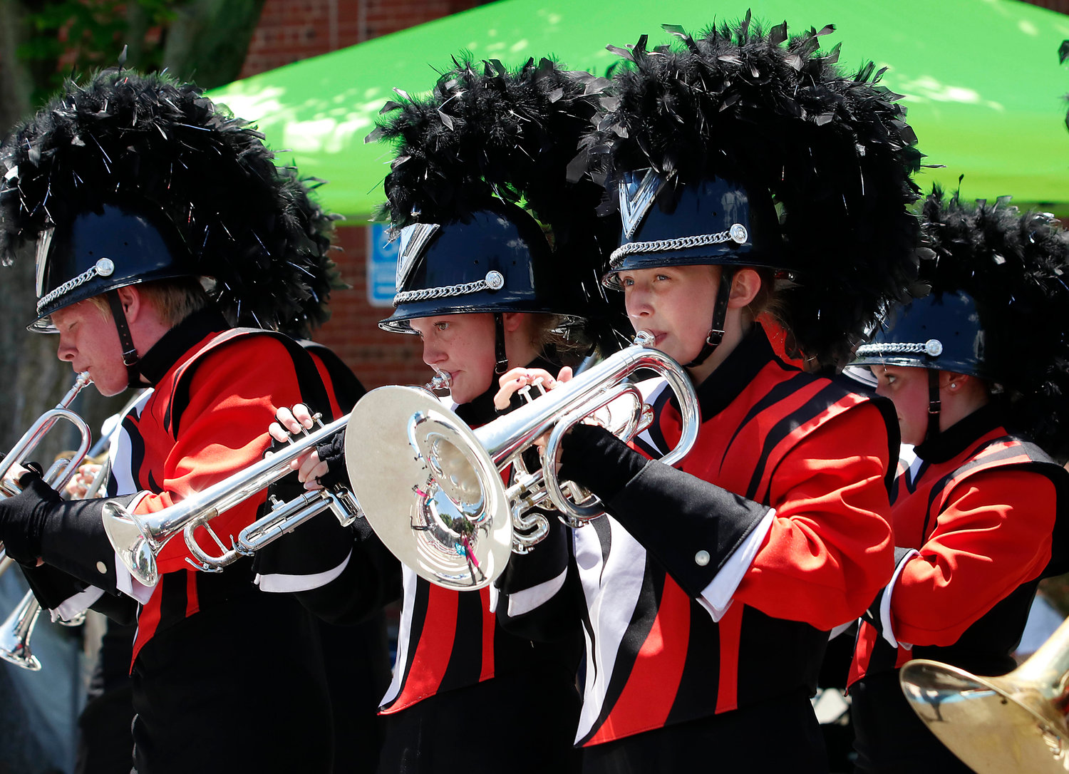 Members of the Tiger Band perform in front of the Chief Marshal's tent.