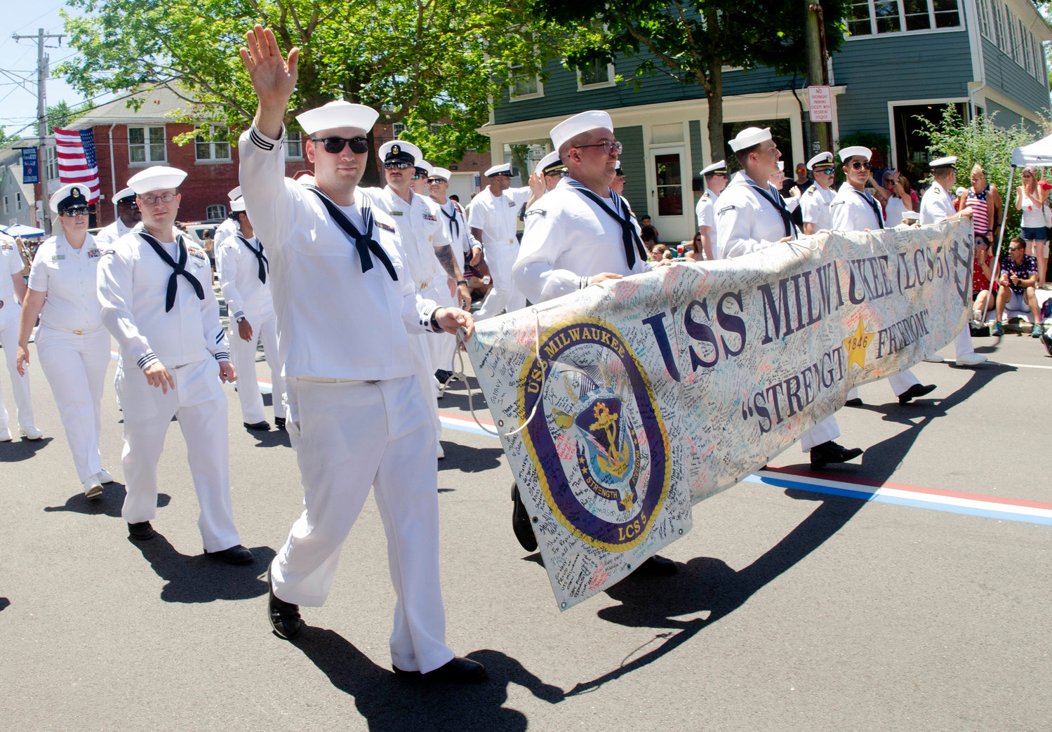 Members of the USS Milwaukee march down High Street.