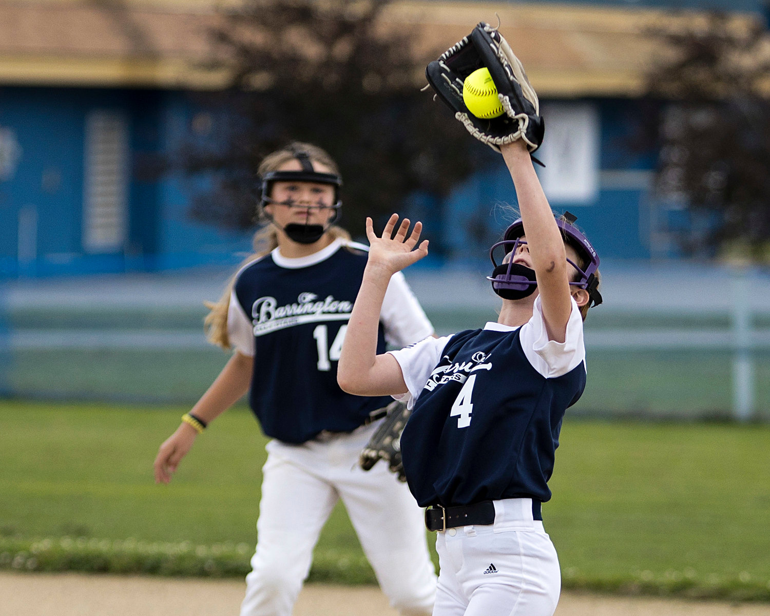 Sky LoVerme gets a glove on a hit in the first inning of Tuesday's playoff game, against Middletown.
