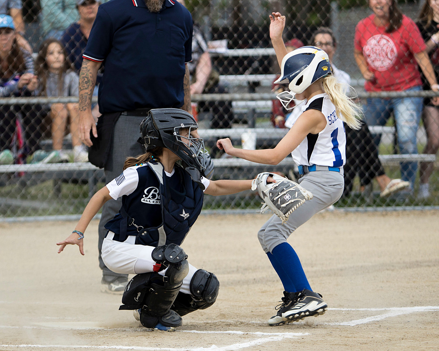Angie Promades tags a Middletown runner at home plate.