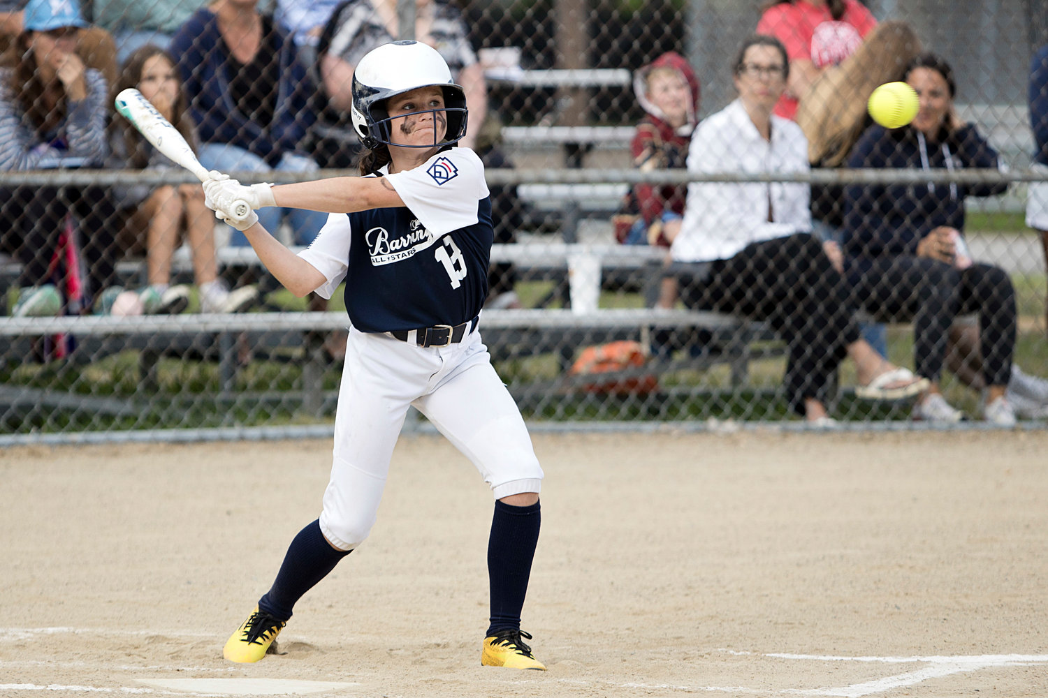 Keira Martin times the ball while up to bat against Middletown.