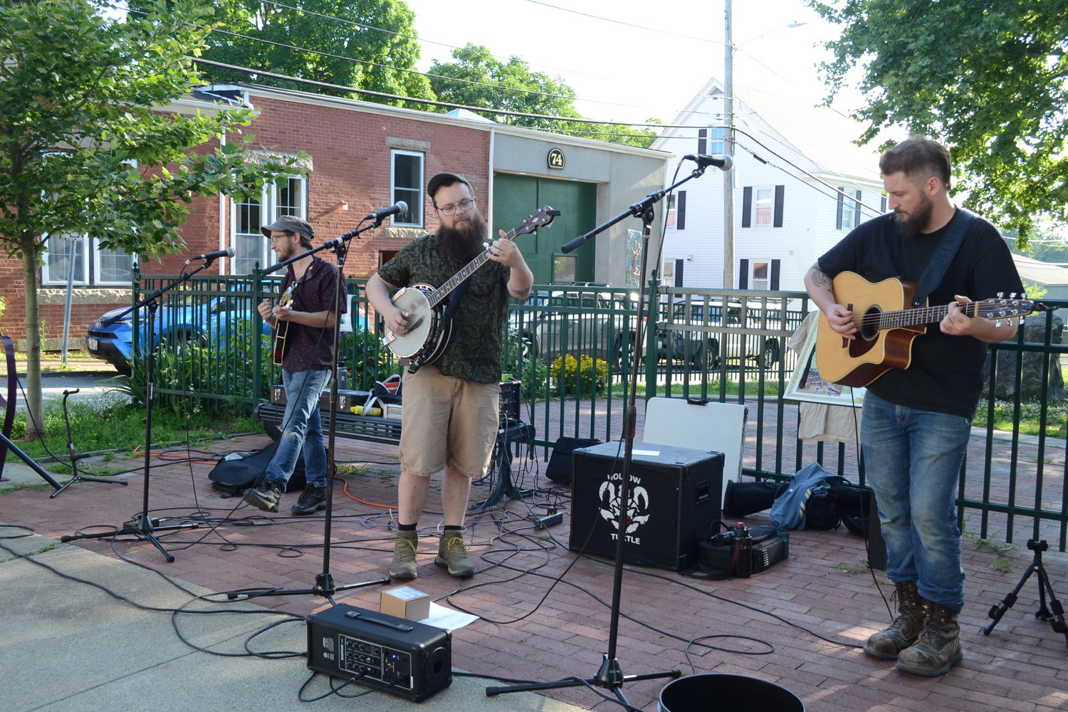 Folk trio Hollow Turtle provided a spirited ambiance near the Town Wharf on Thursday night.