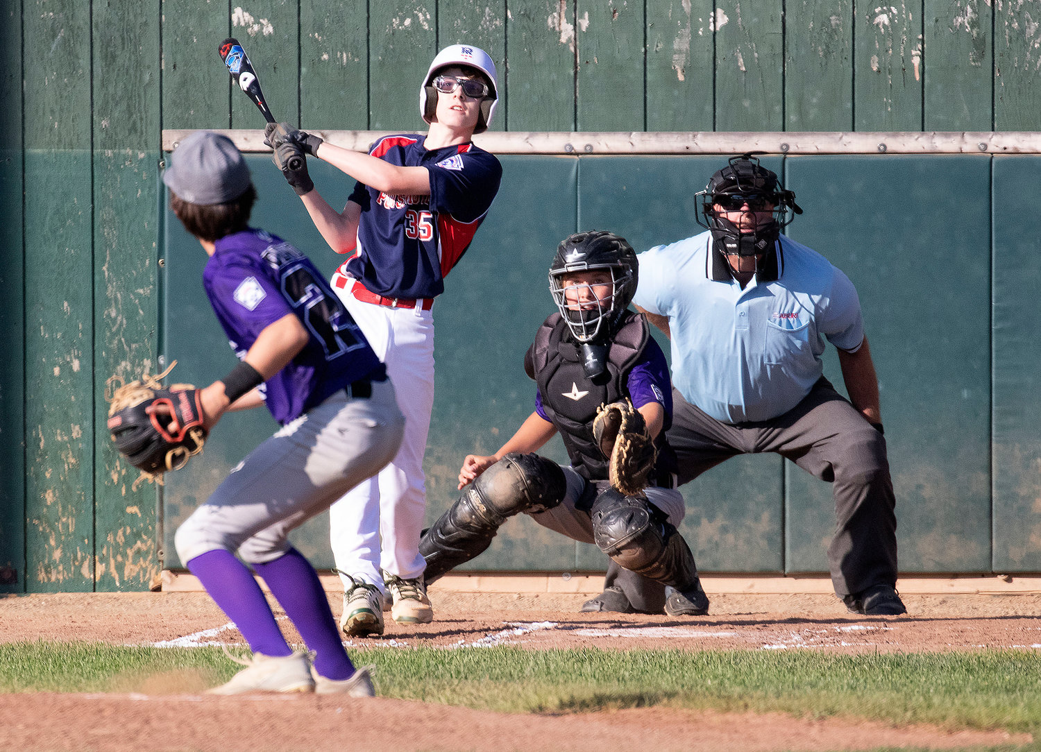 Tyler Boiani blasts a Parker DeWolf pitch over the centerfield fence to give Portsmouth a 2-1 lead in the first inning. Boiani later scored the winning run on a passed ball.