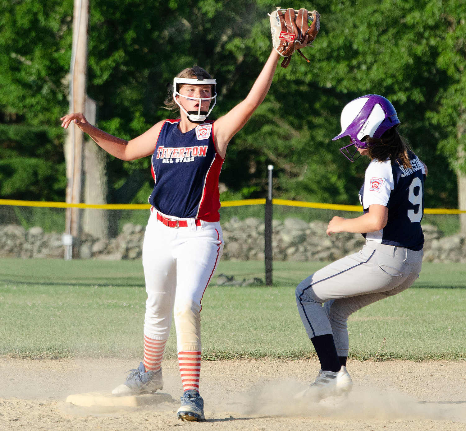 Second baseman Brooke Sowa catches a throw from Kaylyn Aubuchon for an out at second base.