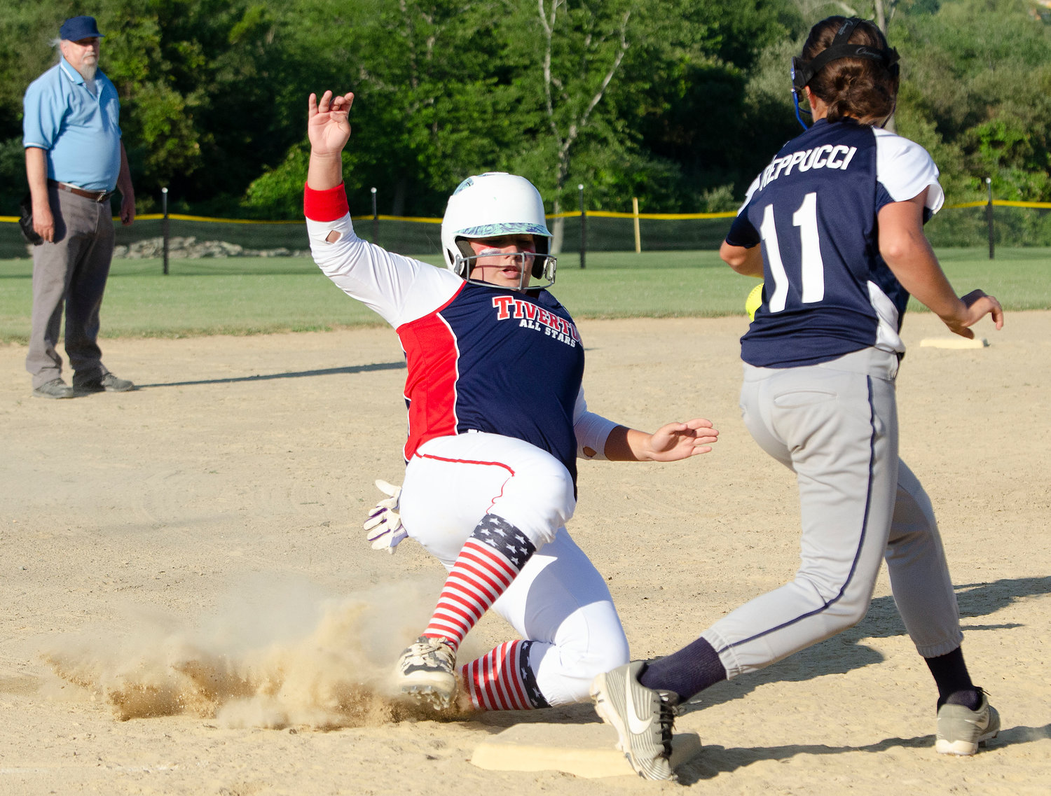 Kaylyn Aubuchon slides safely into third base.