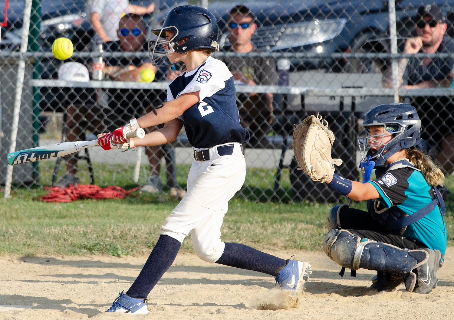Barrington’s Angie Promades gets her bat on the ball during the game against Cranston Western.