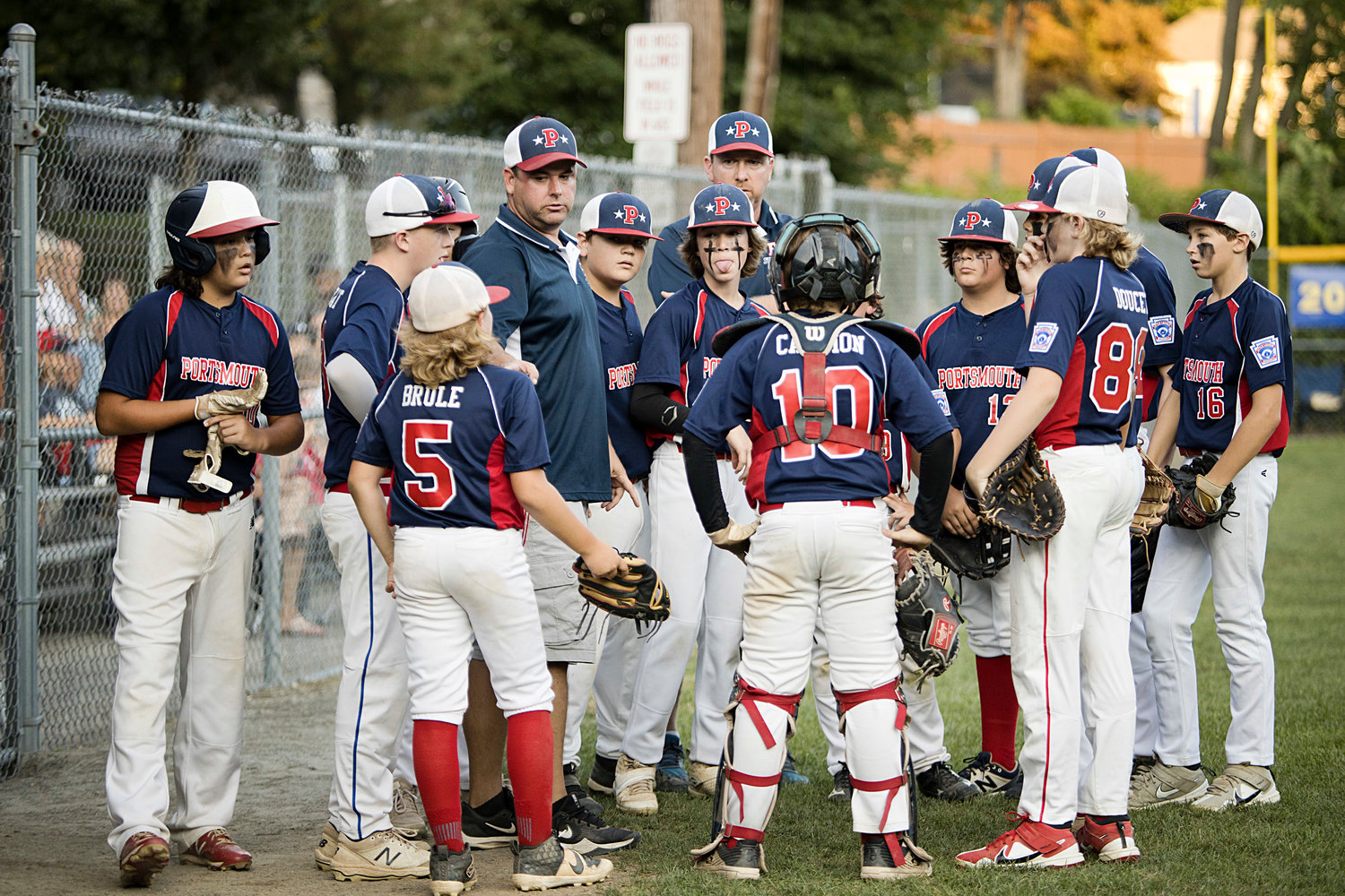 Portsmouth players talk between innings.