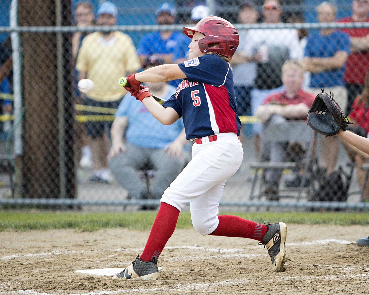 Kane Brule gets his bat on the ball while battling Cumberland in the Little League State Finals, Saturday.