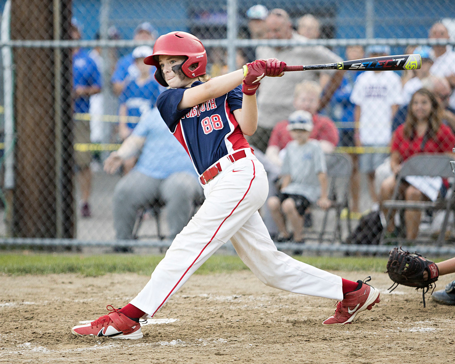 Tyler Doucet follows through with a swing while competing against Cumberland.