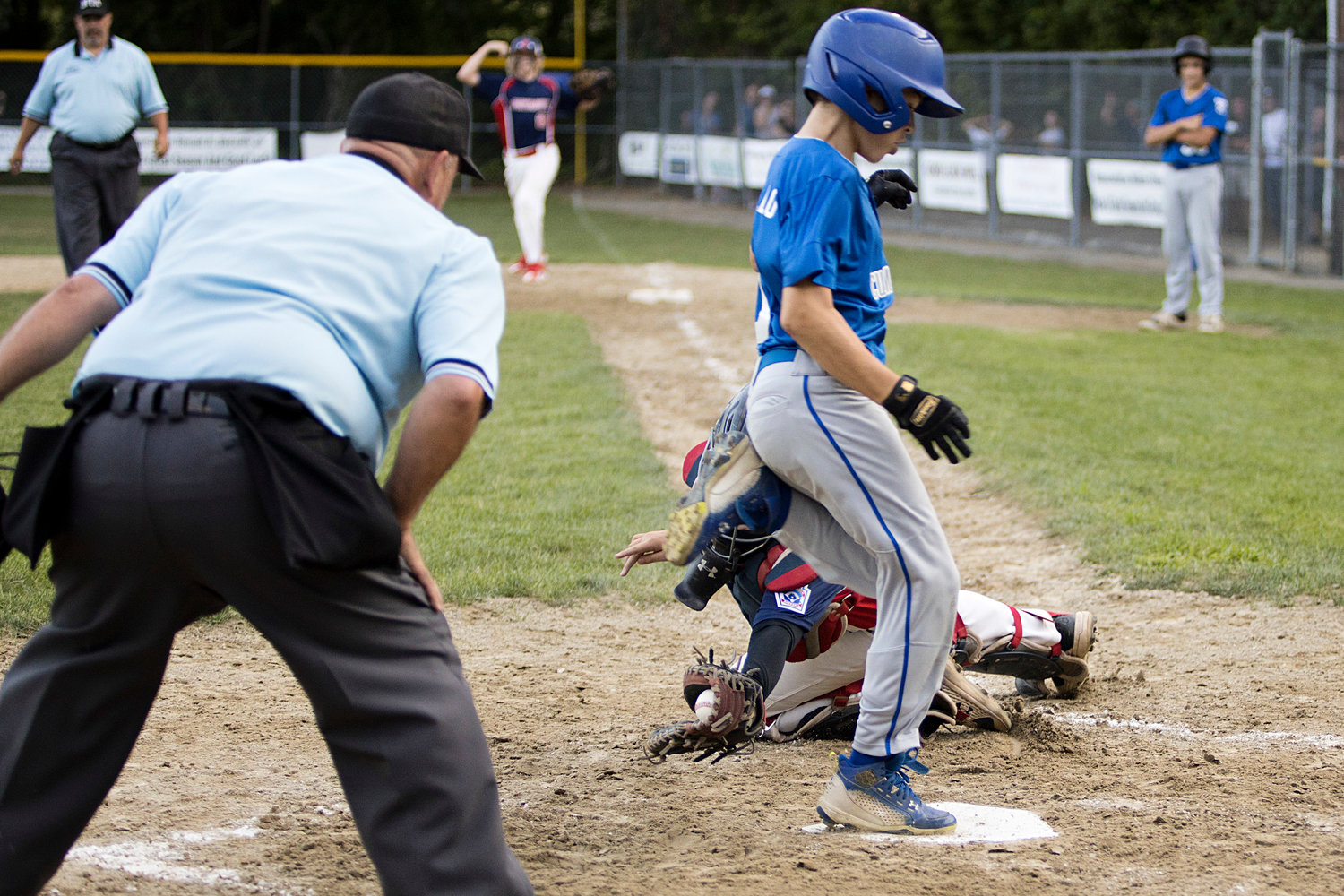 Catcher Ryan Campion just misses the tag as Cumberland’s Dean Corvello steps on home plate in the second inning.
