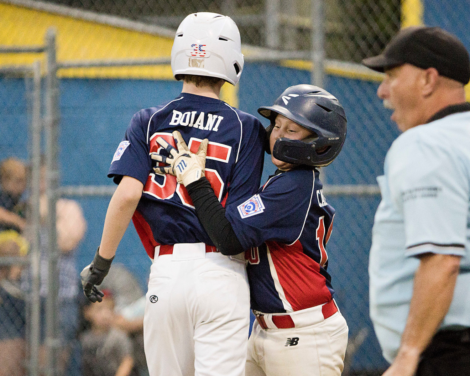 Ryan Campion (right) hugs Tyler Boiani following the latter player’s two-run homer.