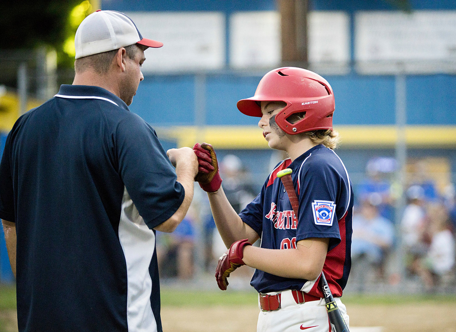 Tyler Doucet is offered encouragement before going up to bat against Cumberland.