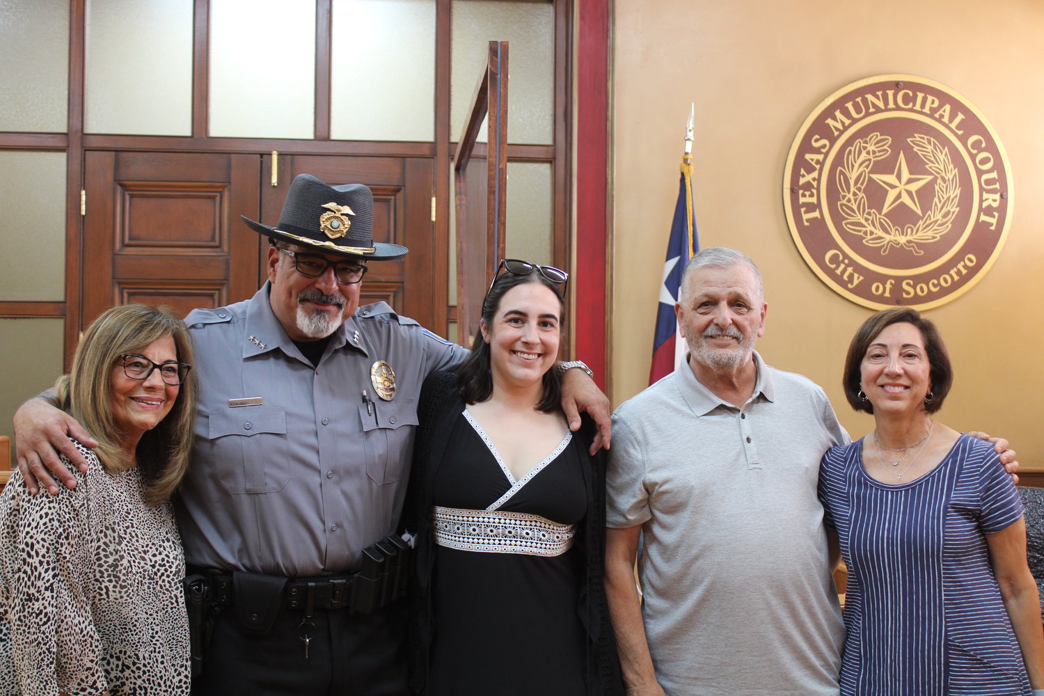 Barrington native Jason Stanzione (second from left) stands for a photo with his family. Stanzione was recently installed as the Deputy Police Chief of Socorro, Texas.