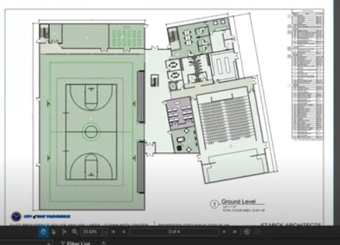 A schematic of the proposed Community Center layout, including areas for athletics (left) and office/public spaces (right).