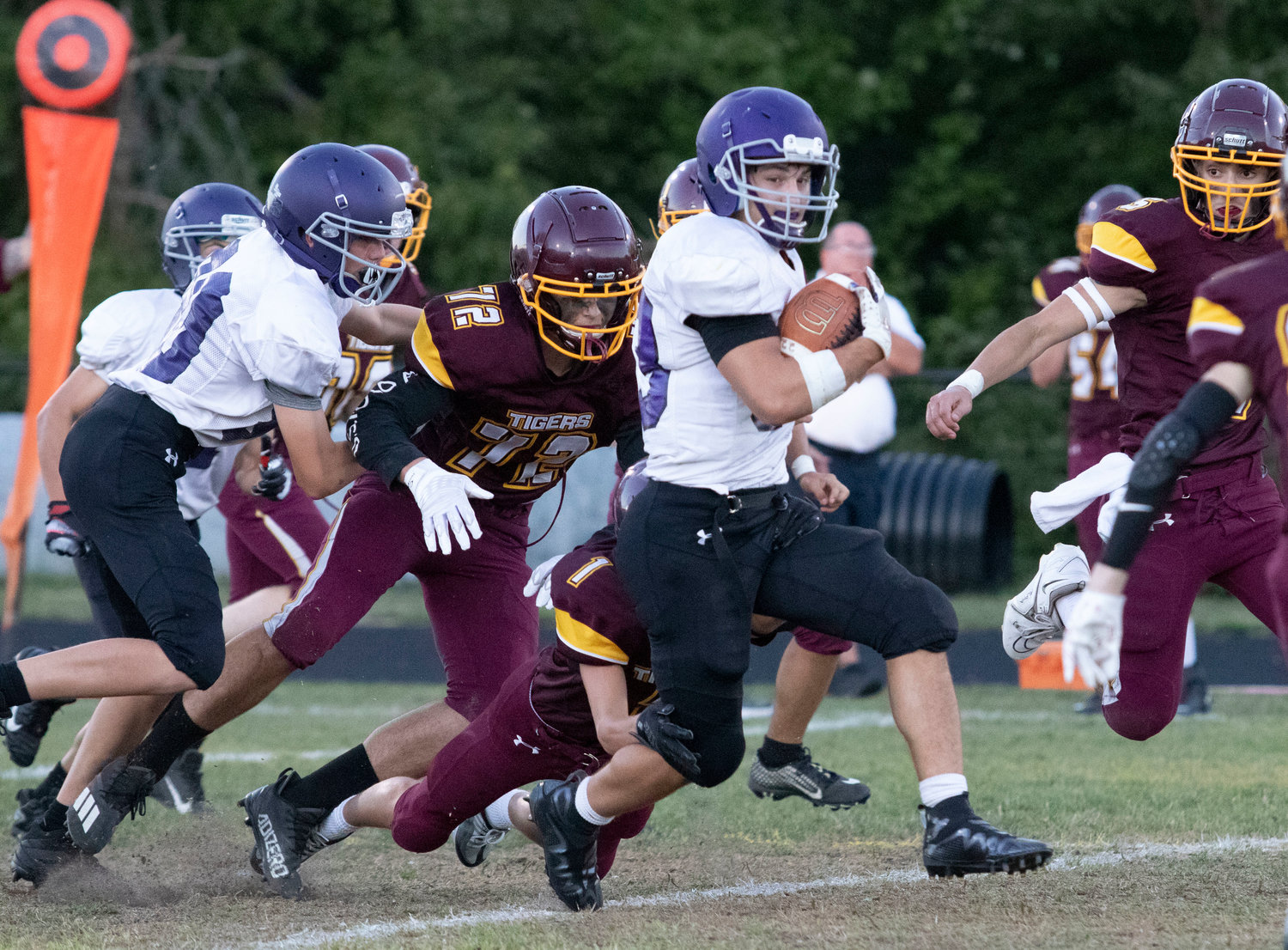 Brock Pacheco runs up the middle during the Huskies first scoring drive.