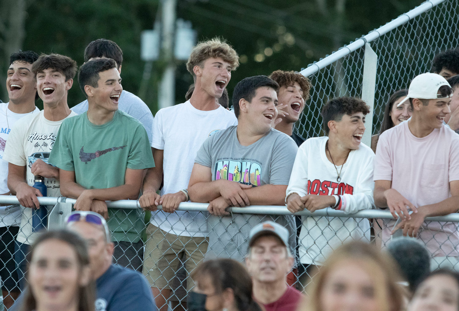 Tiverton fans cheer on the Tigers during the game.
