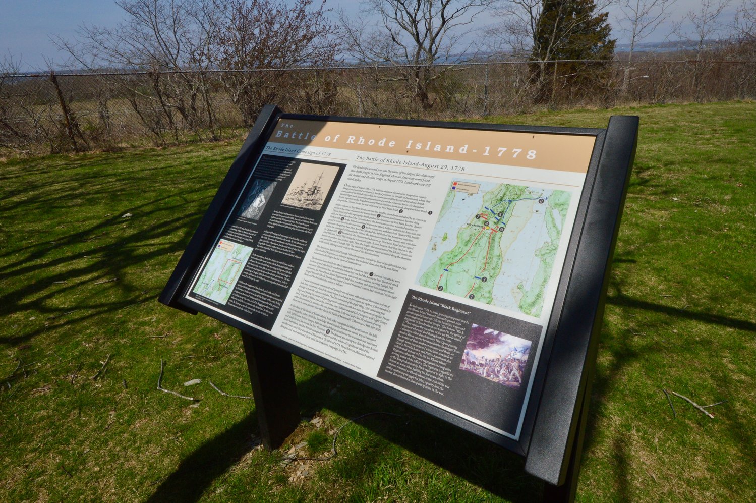 A sign at Heritage Park in Portsmouth explains the site’s connection to the Battle of Rhode Island of 1778.