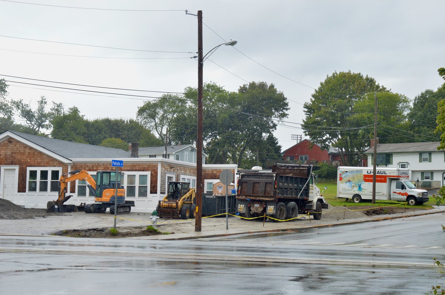 The contractor for Rhode Island Oak Counseling and Wellness, a new business where the old Kaufman's Hardware used to sit, plans to put in a curb cut so vehicles can enter via East Main Road and exit onto Patriots Drive.