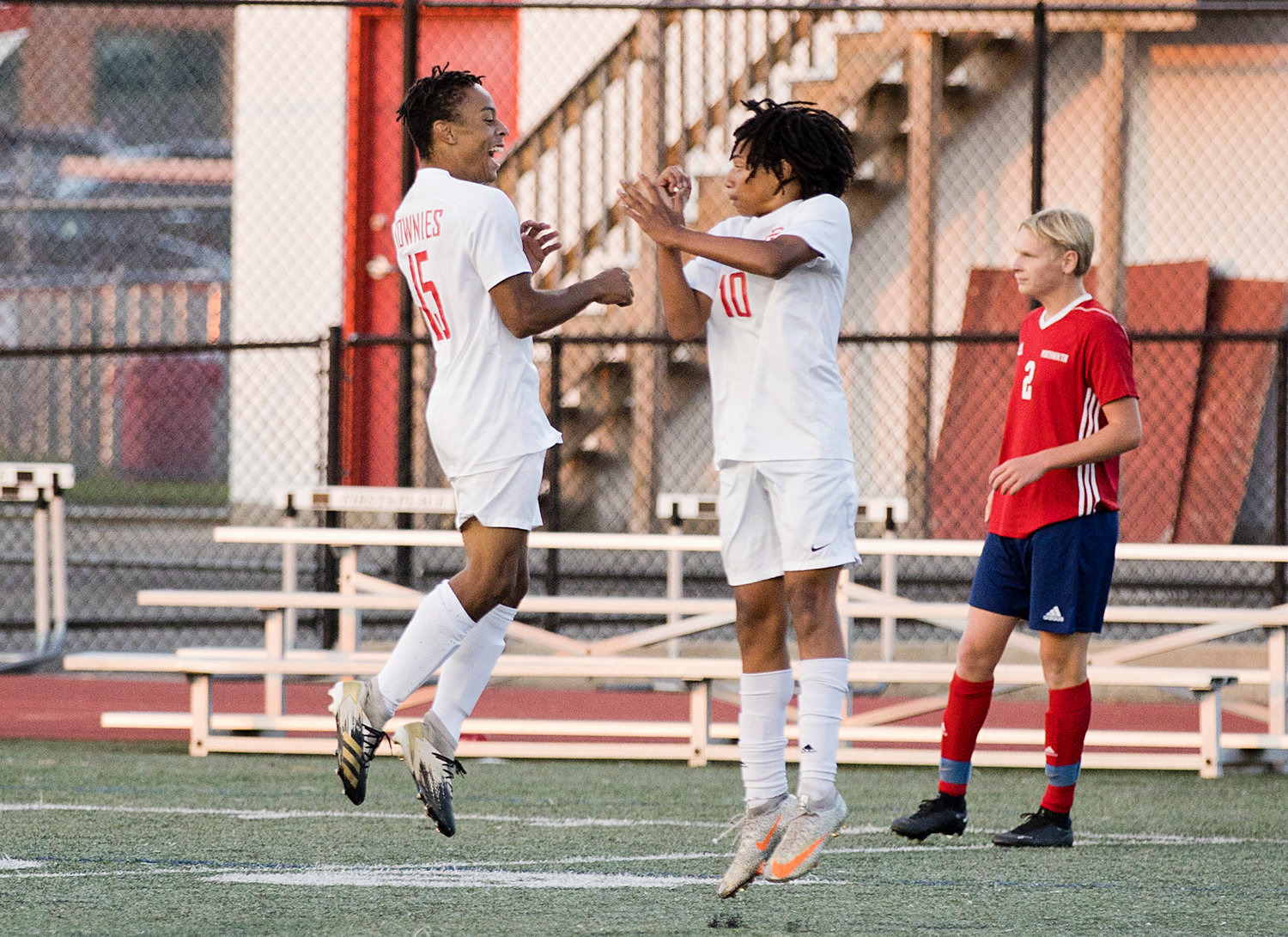 Martim Moniz (left) and Ricardo Lima celebrate a game tying goal during the first half of Saturday's game, against Portsmouth.