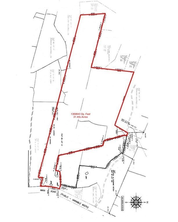 A map shows the 31 acres in question, running west from 559 Main Road (bottom).